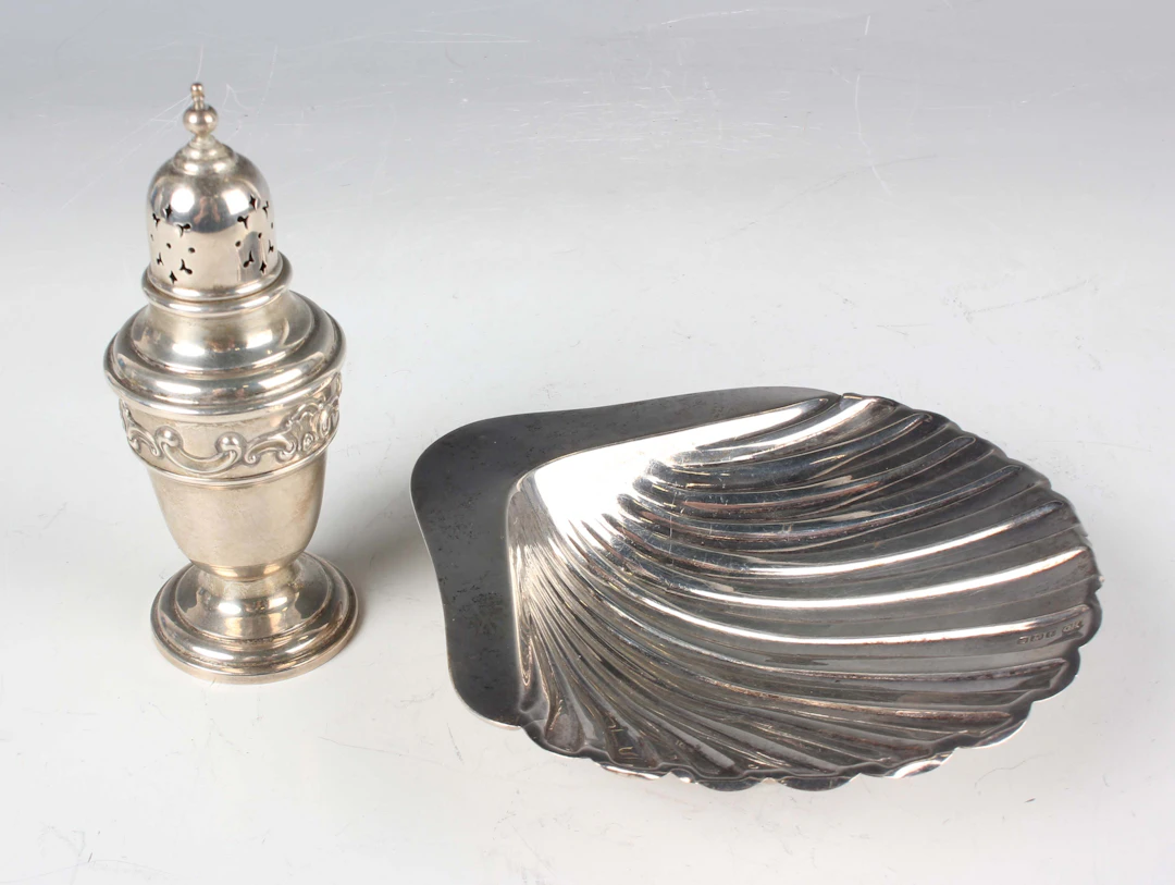 A George V silver butter shell, raised on ball feet, Sheffield 1917
