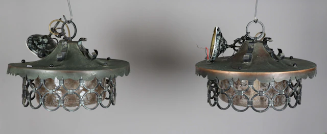 A pair of mid-20th century anodized copper circular ceiling lights