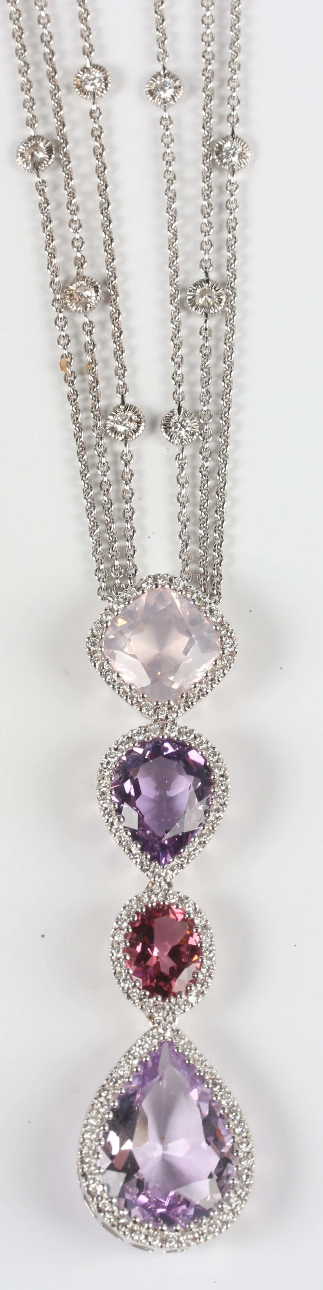 An 18ct white gold, amethyst, rose quartz, pink tourmaline and diamond