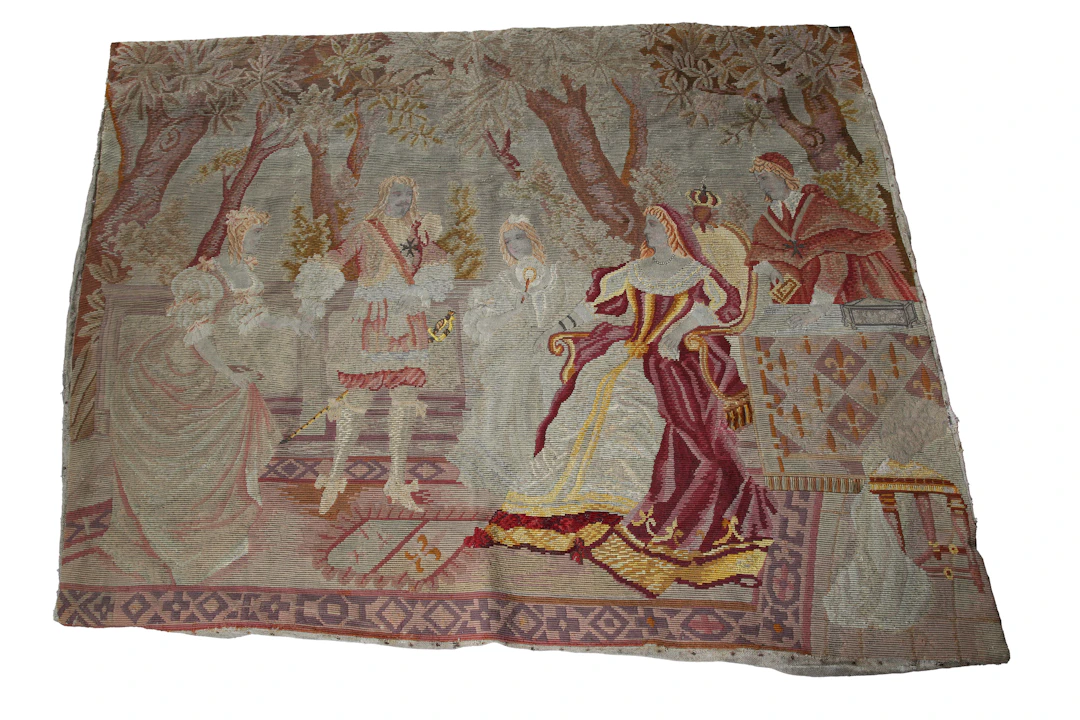 A 19th century French tapestry wall hanging, worked with an exterior