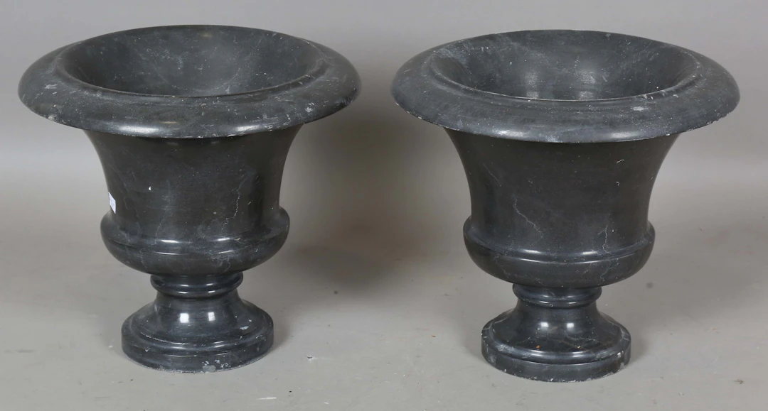 A pair of 20th century turned and polished slate garden urns, height