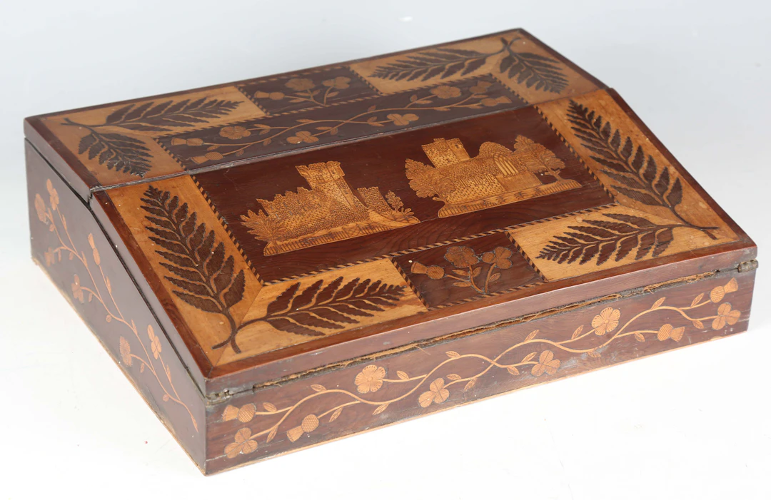 A 19th century Kilarney ware marquetry writing box, the two hinged