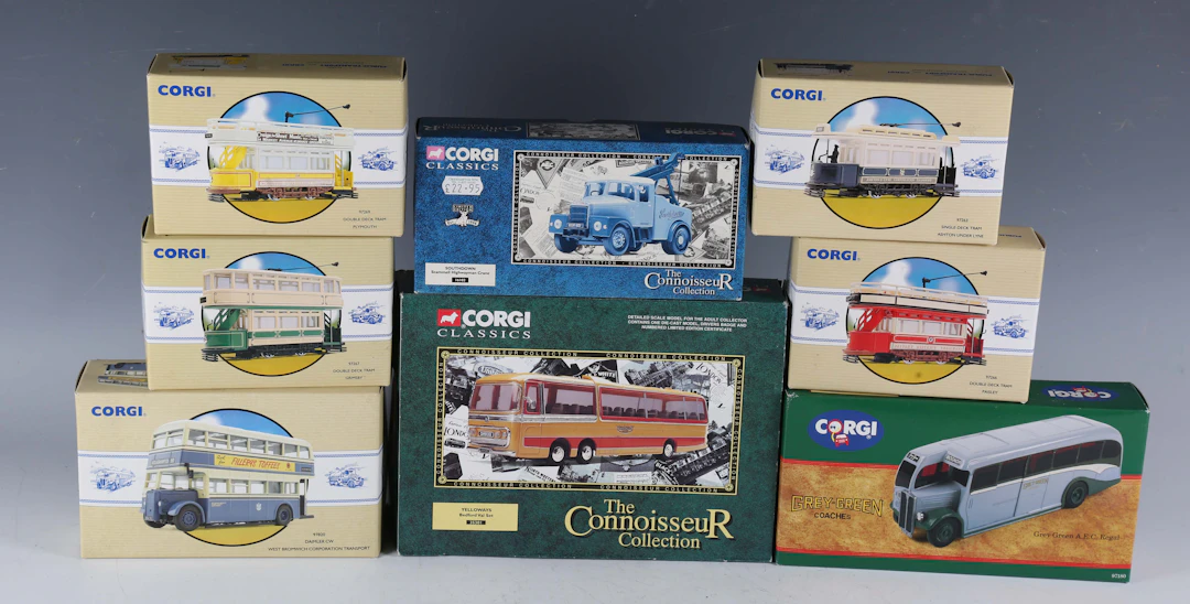 A collection of Corgi Classics buses, coaches and trams, including