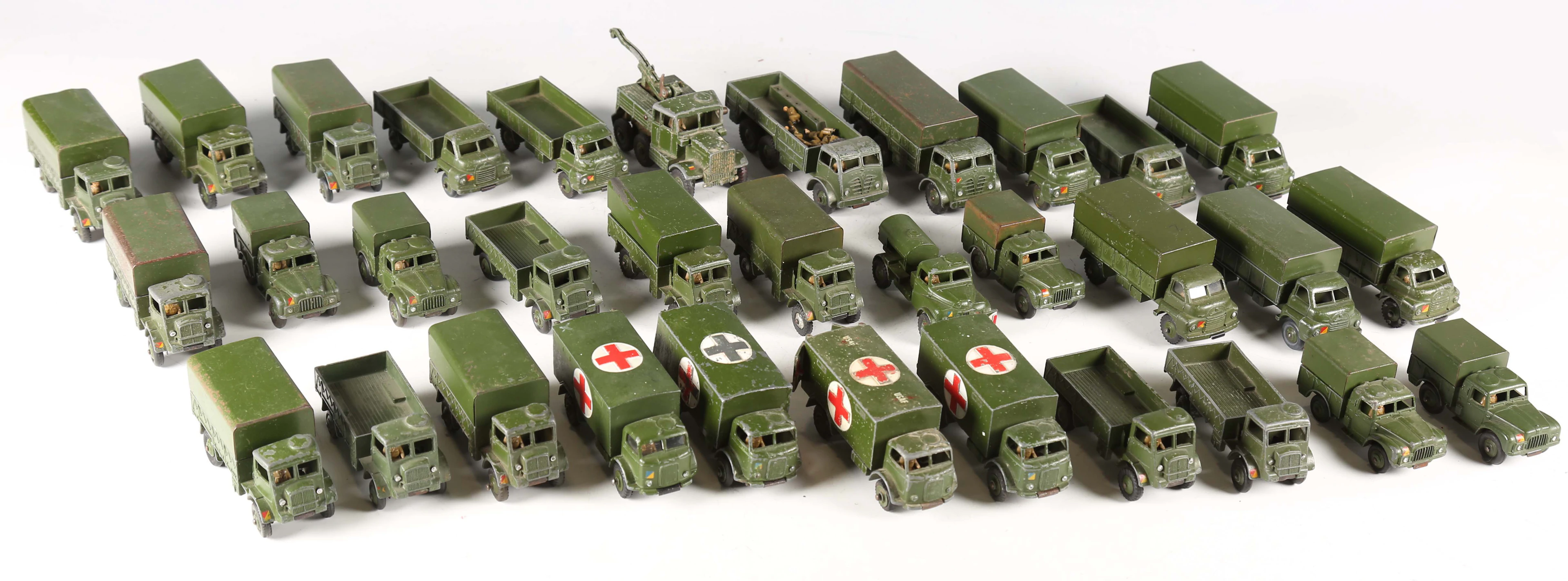 A good collection of Dinky Toys and Supertoys army vehicles and accessories