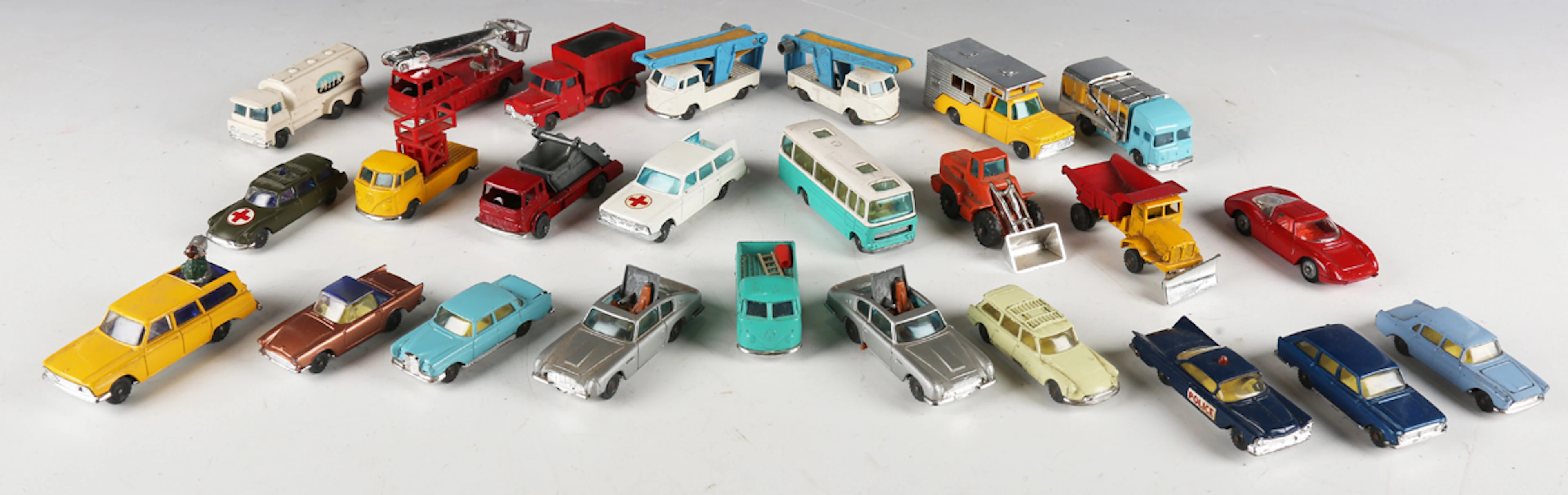 Twenty-five Corgi Toys Husky vehicles, including two No. 1401 James