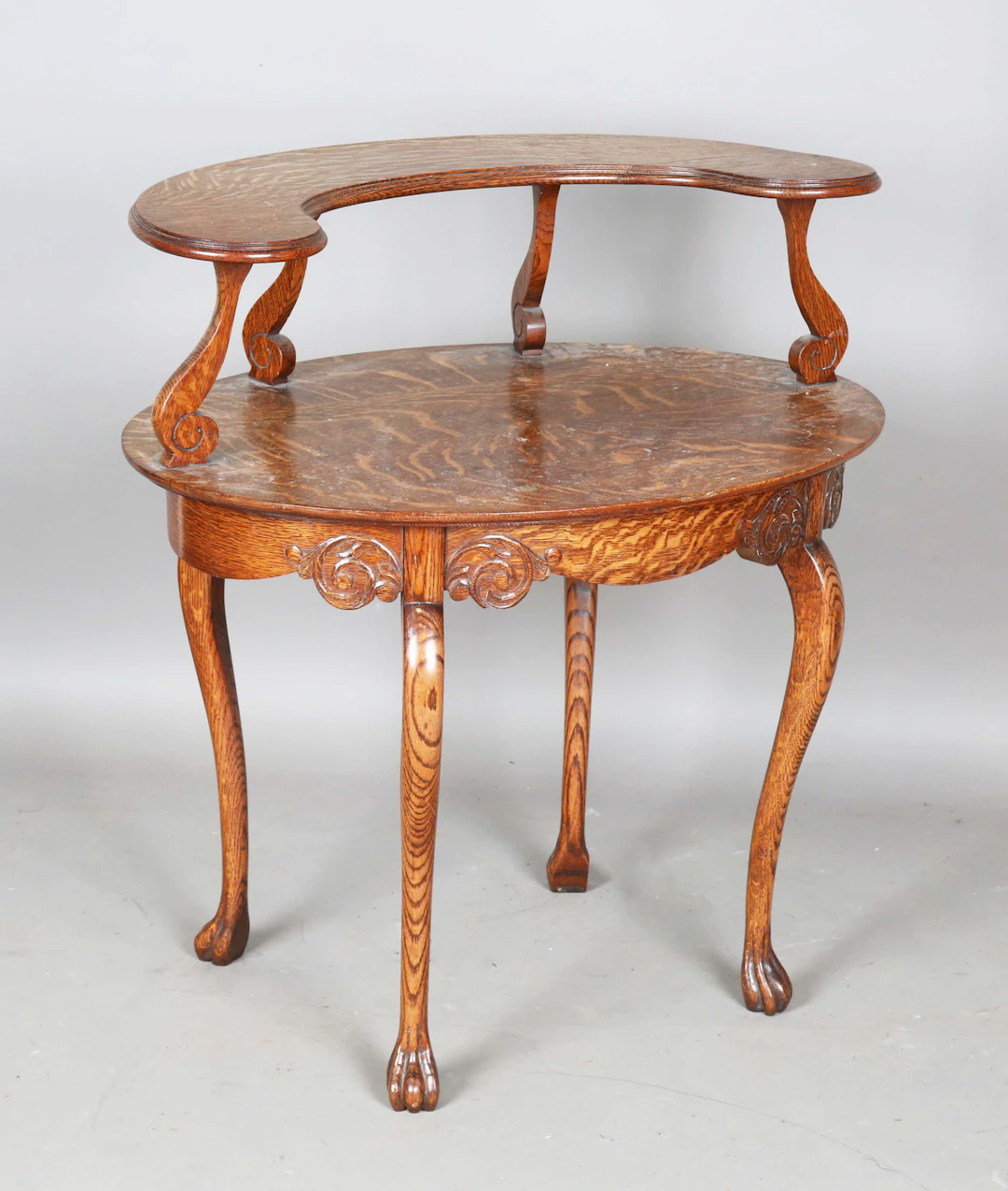 An unusual early 20th century well-figured oak oval occasional table