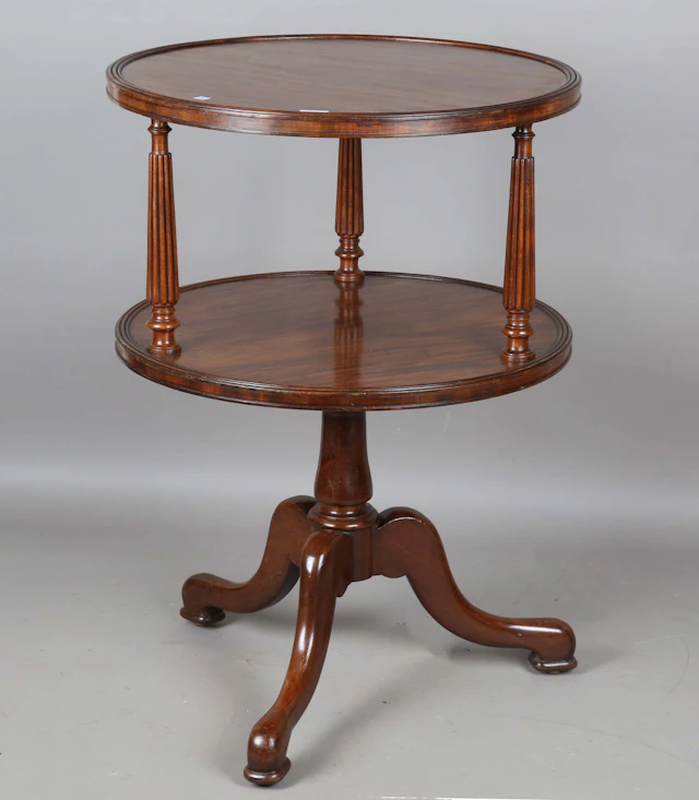 A mid-19th century French mahogany circular two-tier revolving dumb