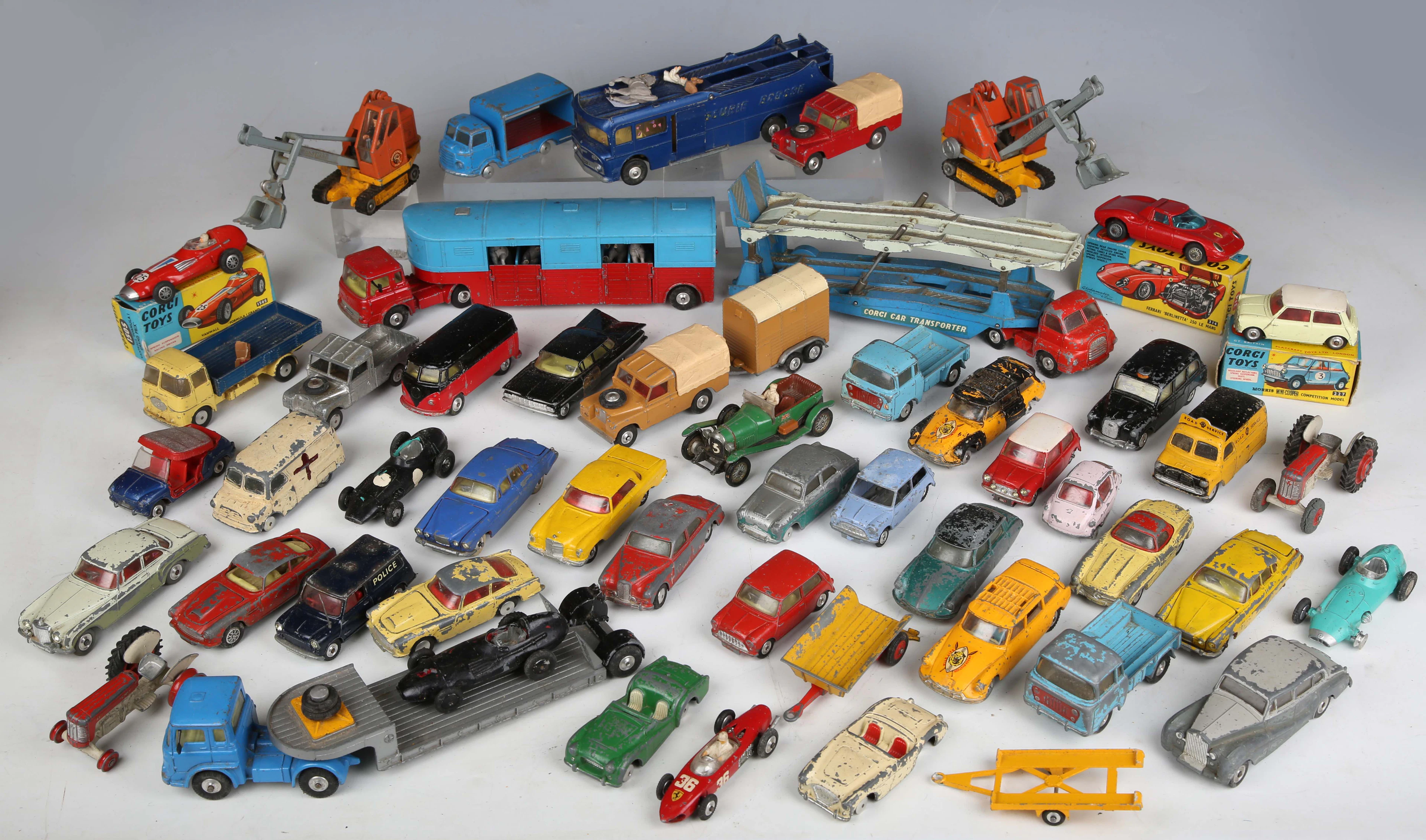 A collection of Corgi Toys vehicles, including No. 227 Morris Mini-Cooper