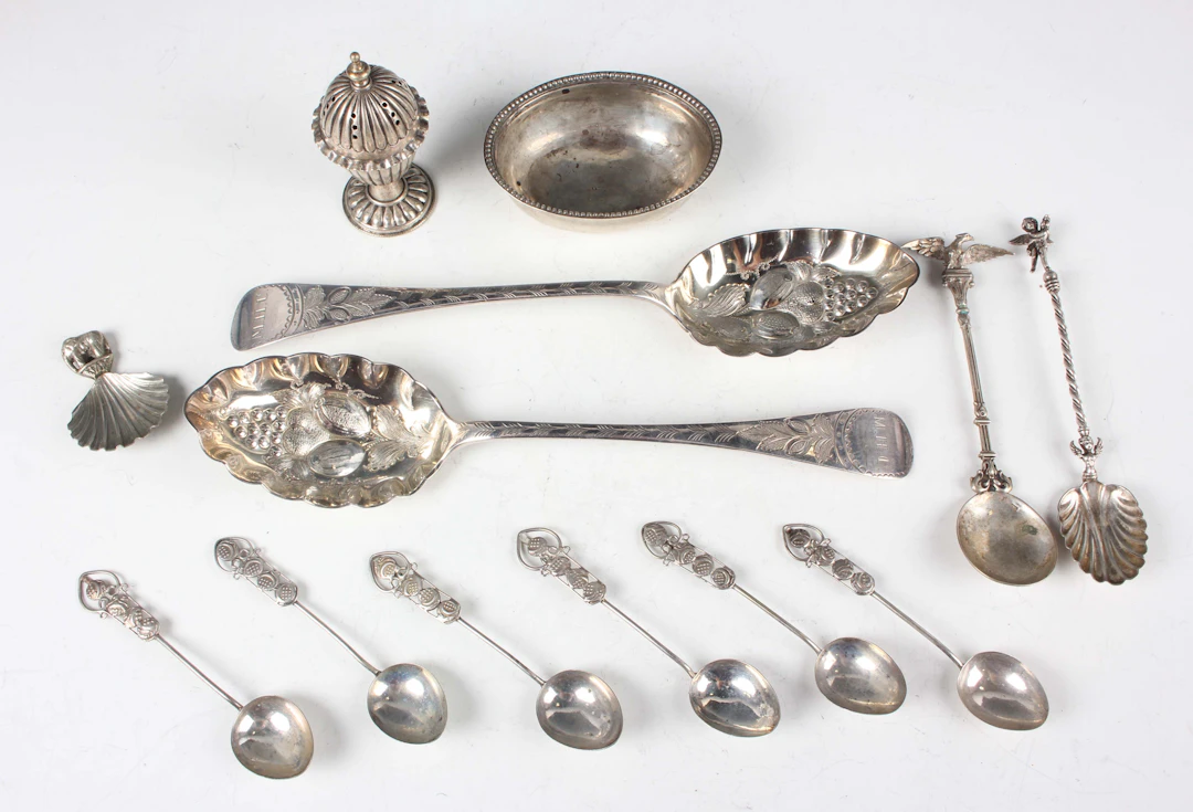 A small group of silver, comprising an oval toddy ladle bowl, a set
