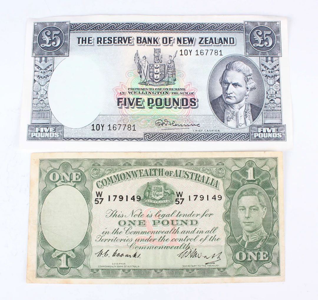 A small collection of Australian and New Zealand banknotes, including
