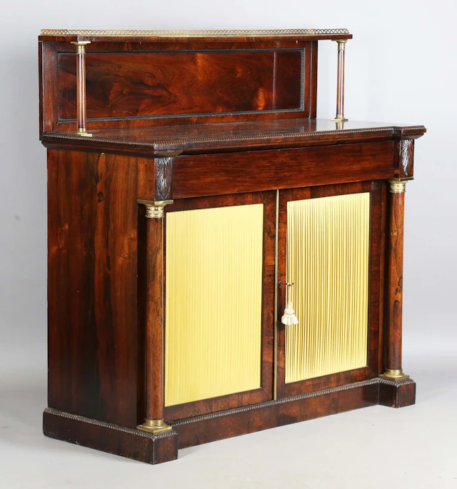A Regency rosewood and gilt metal mounted chiffonier with beaded mouldings