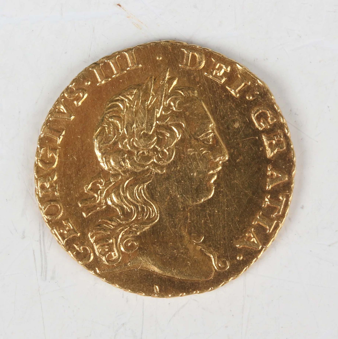 A George III third-guinea 1762, laureate head, Sp 3741 (some light