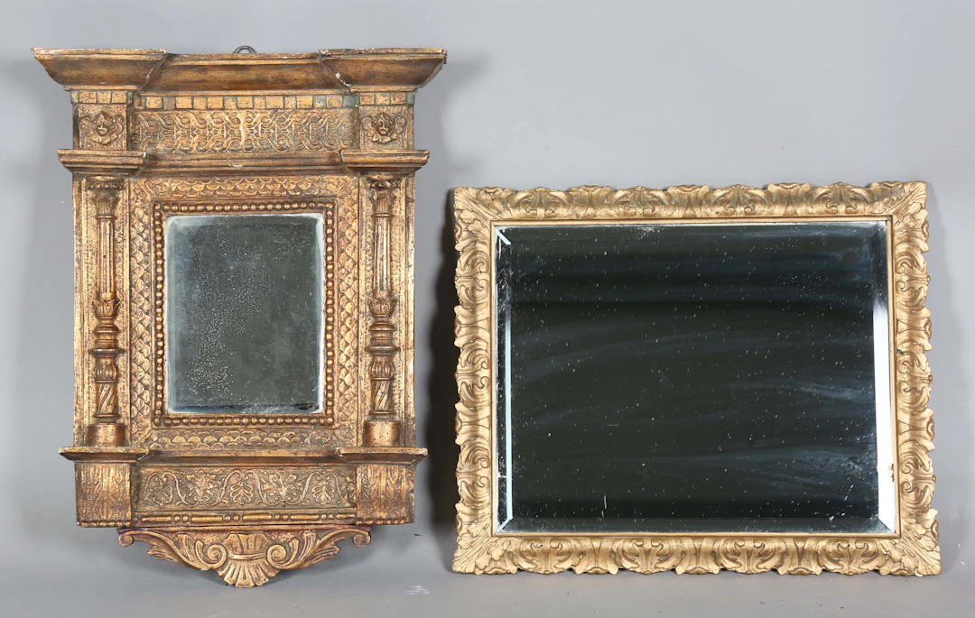 A Continental giltwood wall mirror of architectural design, 51cm x
