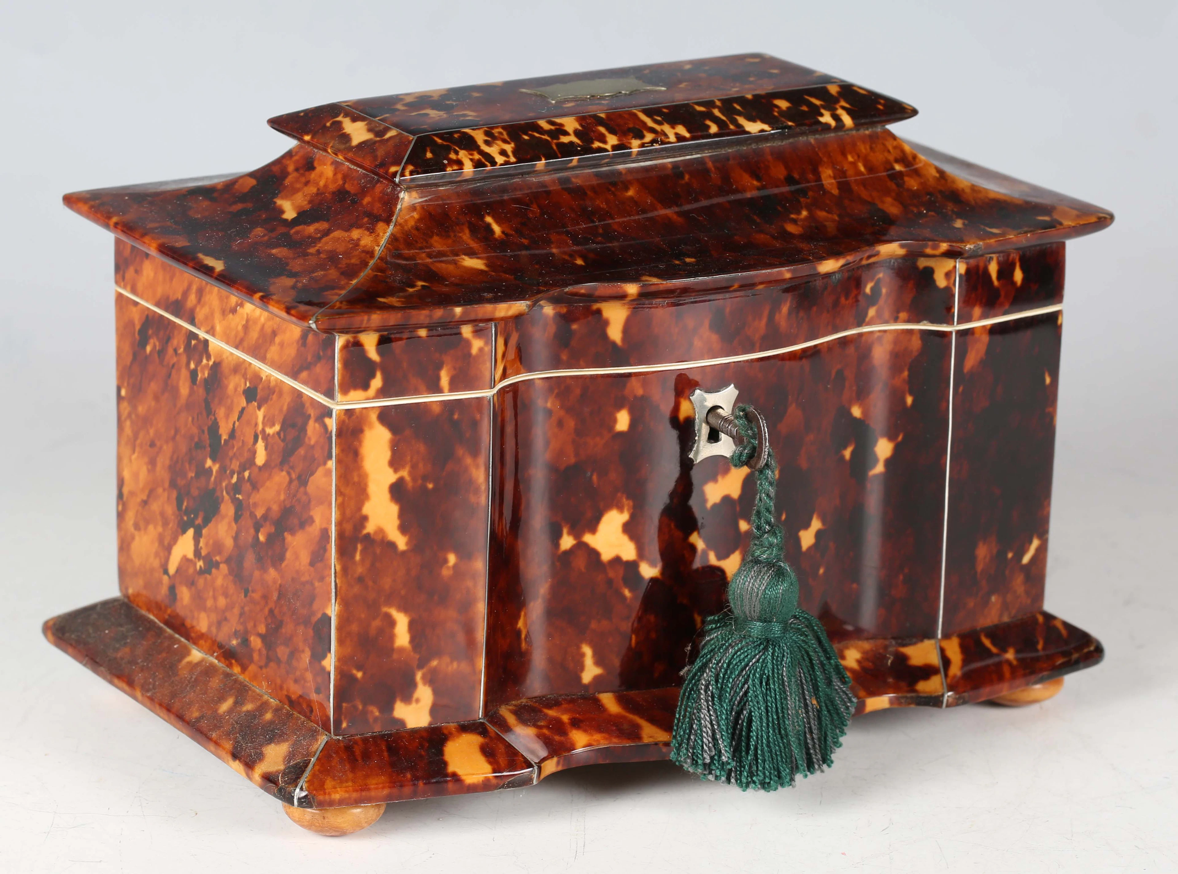 A Regency tortoiseshell tea caddy with a pagoda shaped lid, hinged