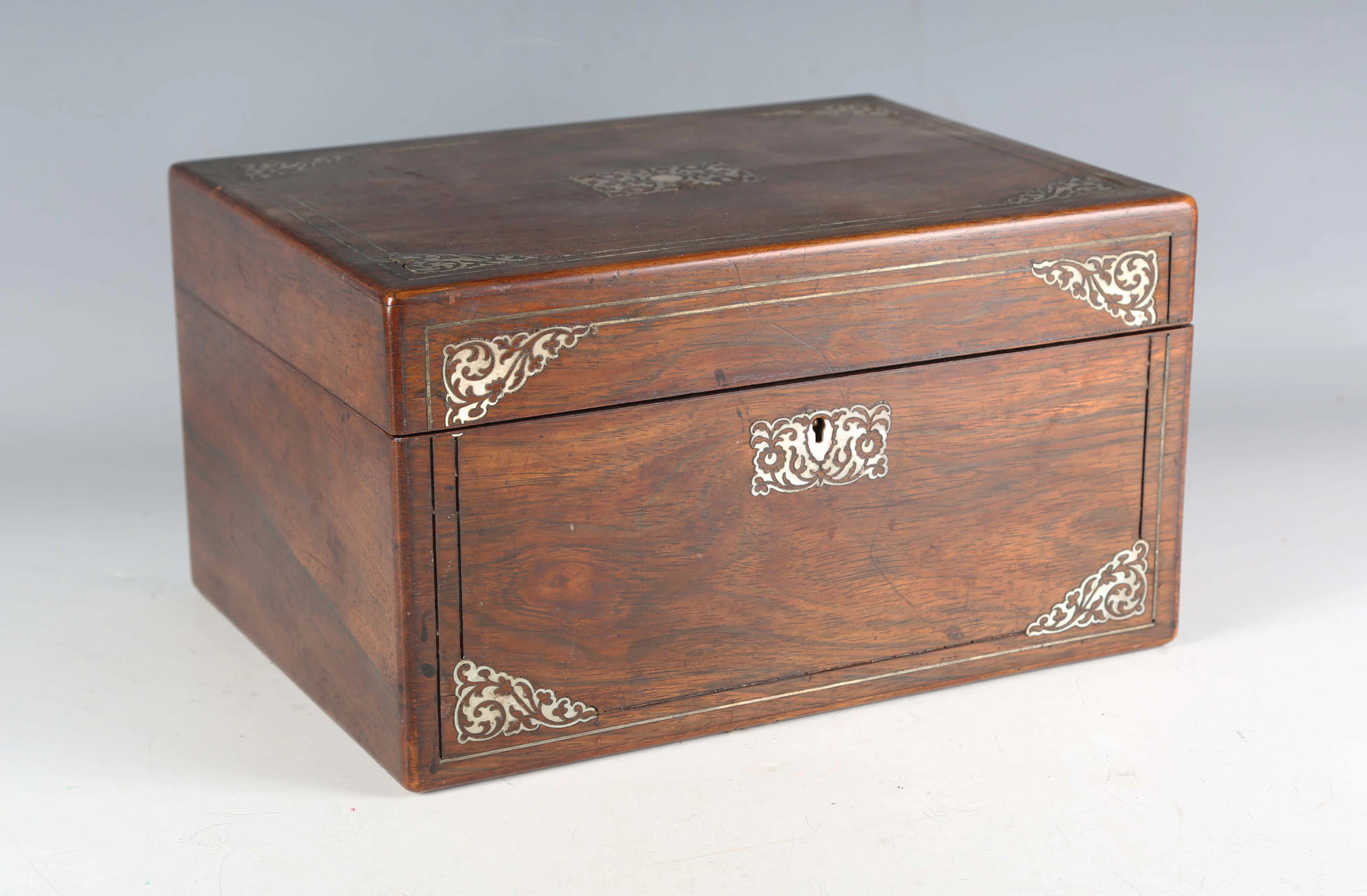 A Victorian rosewood and mother-of-pearl inlaid vanity case, the interior