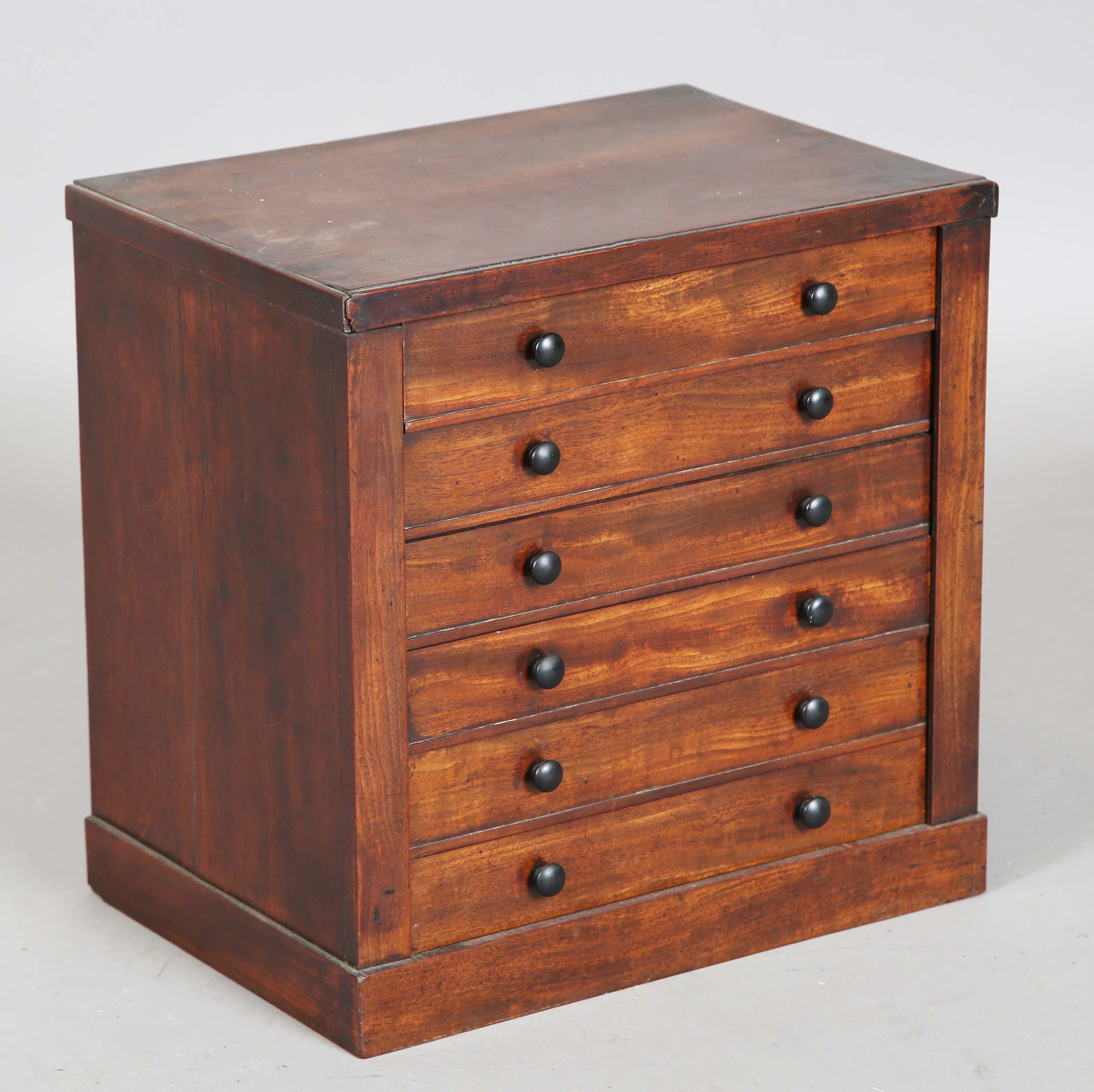 A Victorian mahogany table-top collector's chest of six drawers, height
