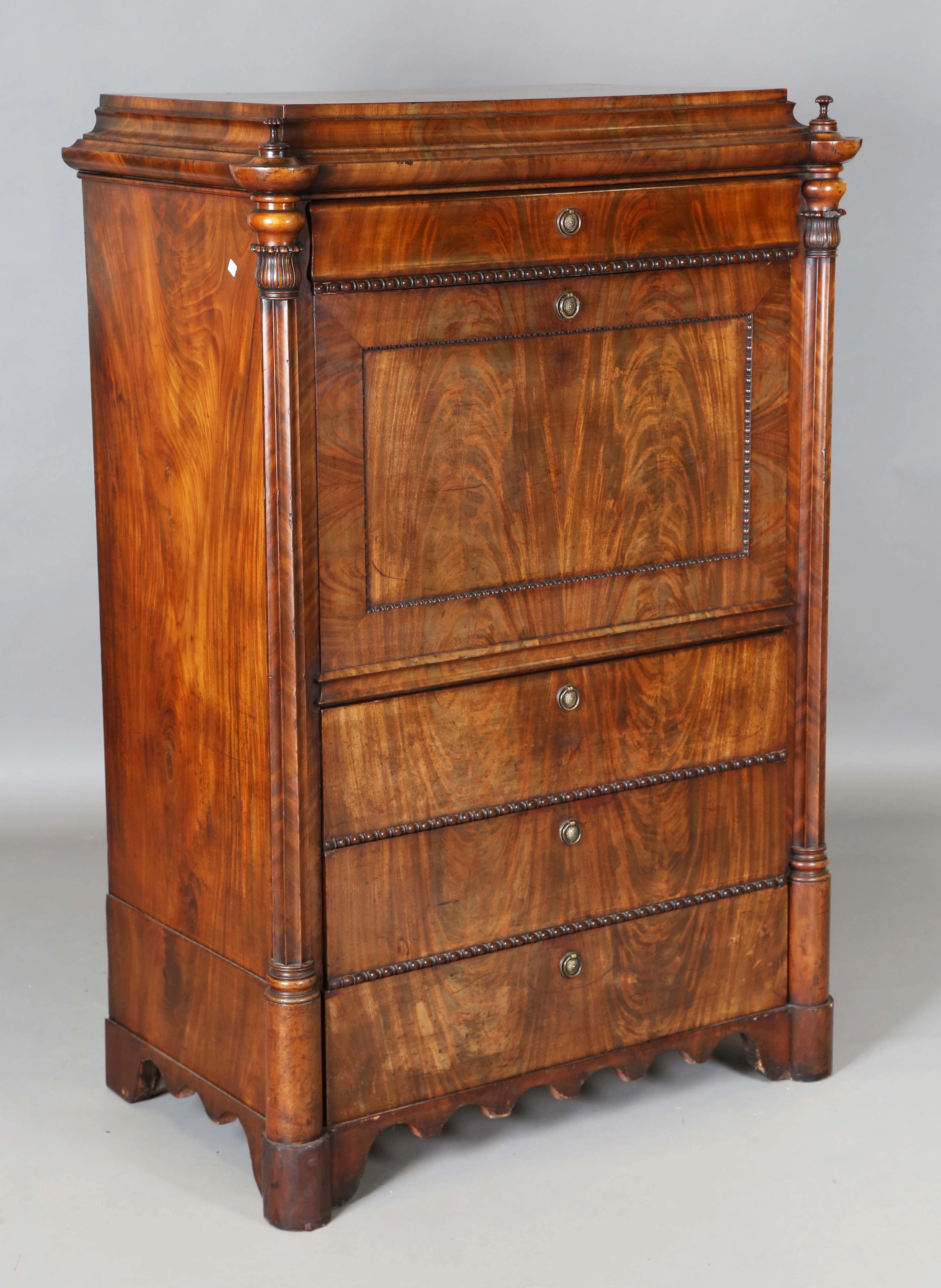 A fine mid-19th century French flame mahogany éscritoire, fitted with