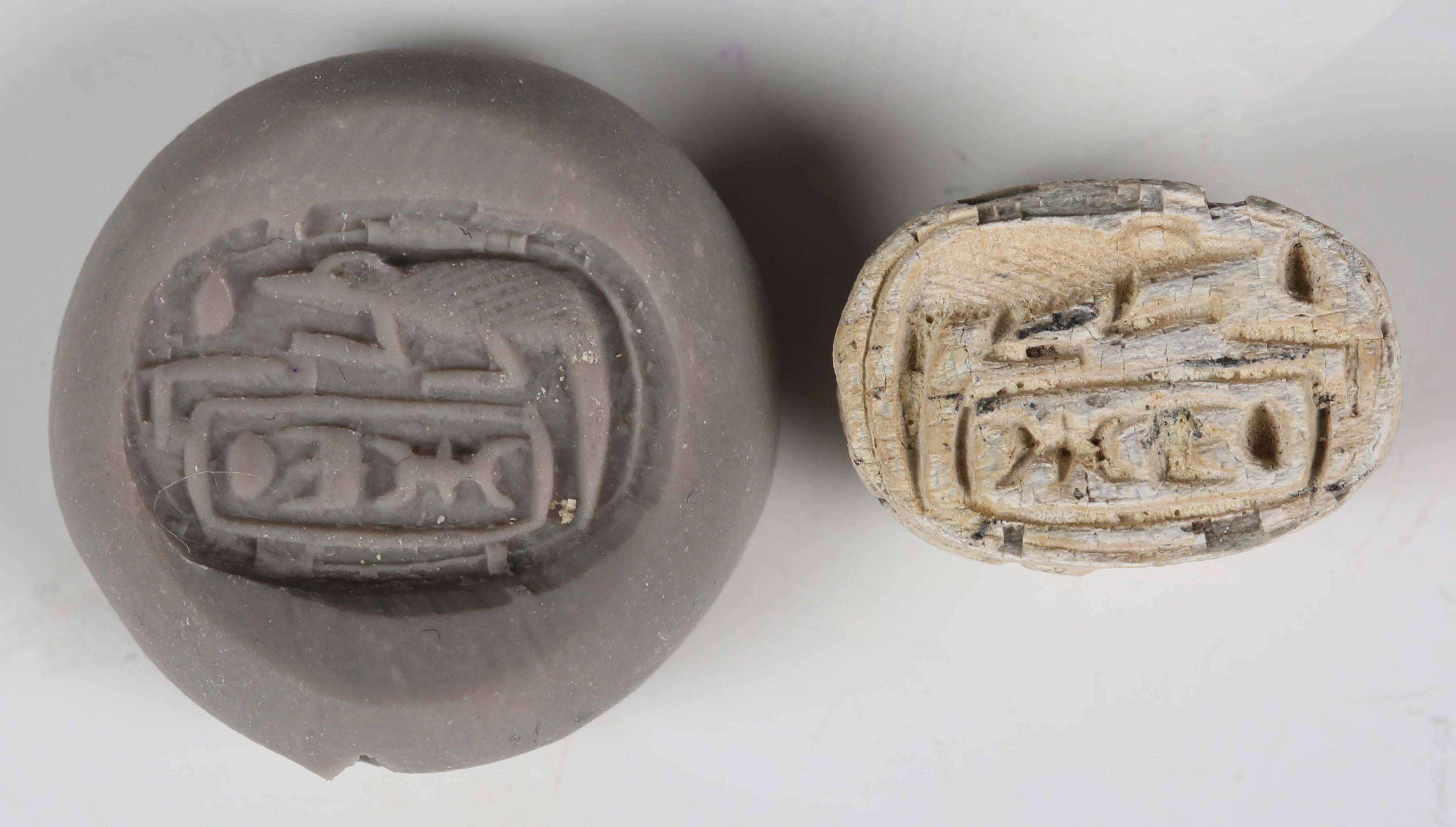 An ancient Egyptian steatite scarab amulet dedicated to Thutmose III