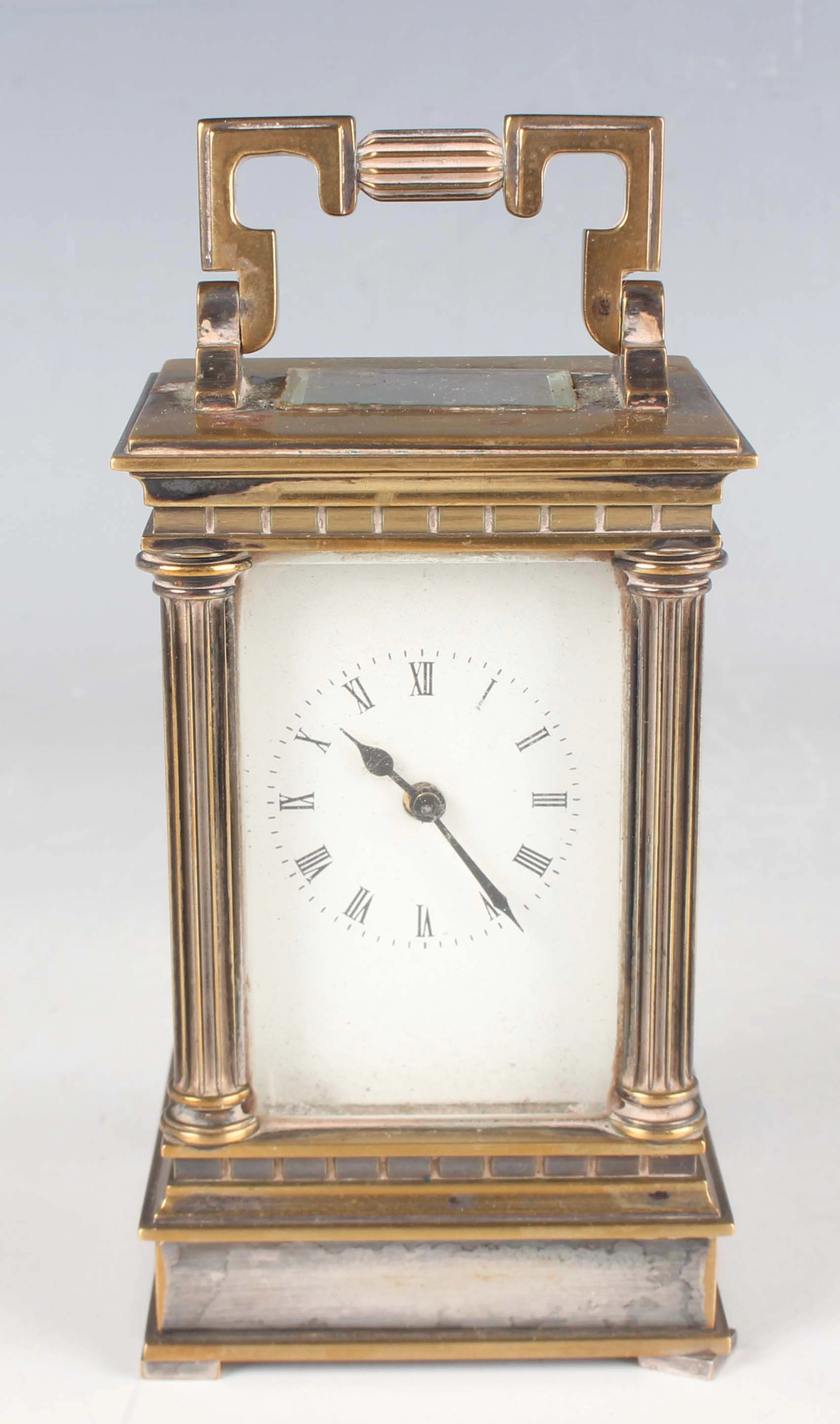 A 20th century brass cased diminutive carriage timepiece, the movement