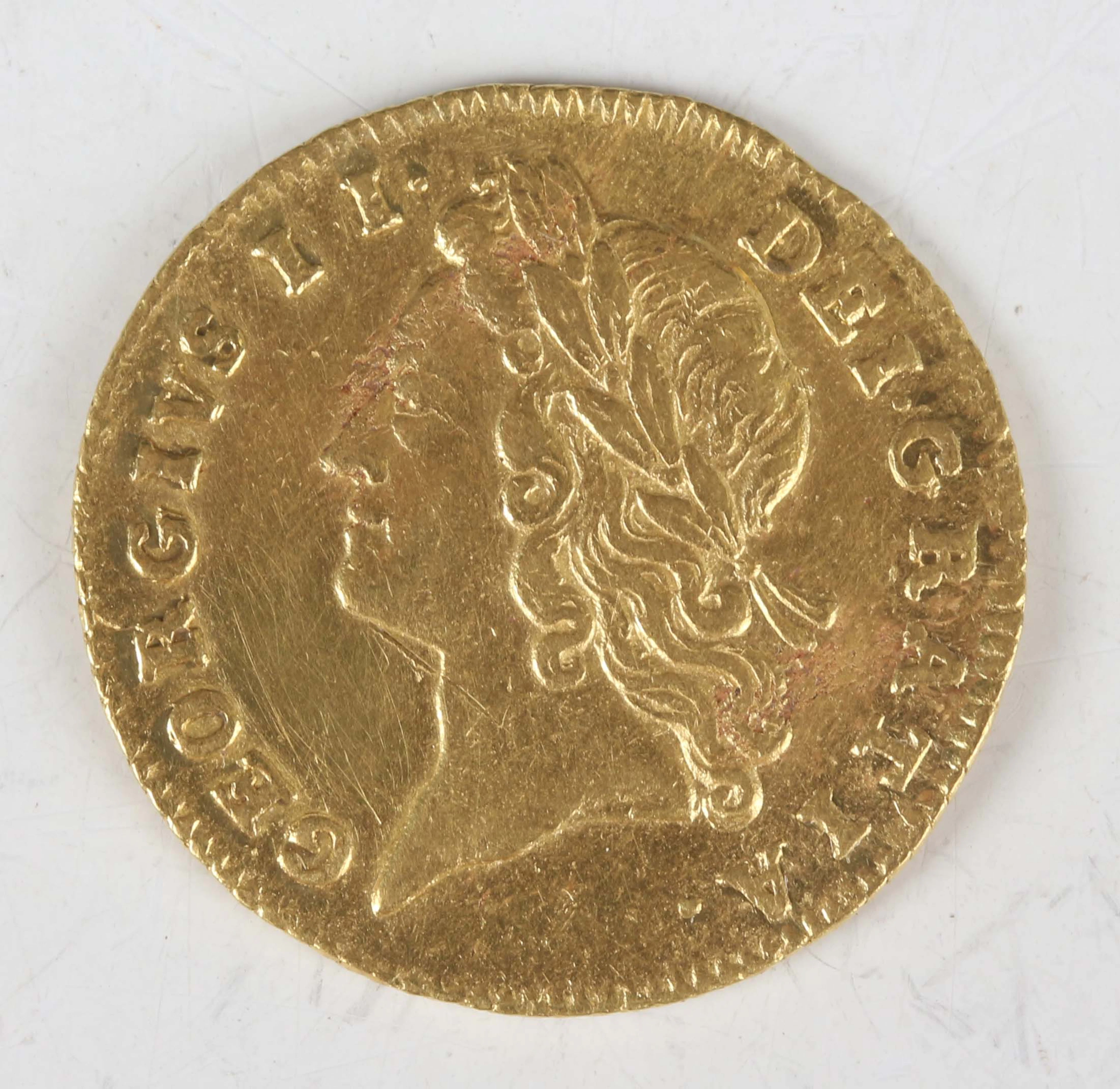 A George II half-guinea 1731, young laureate head, Sp 3681 (an excavated