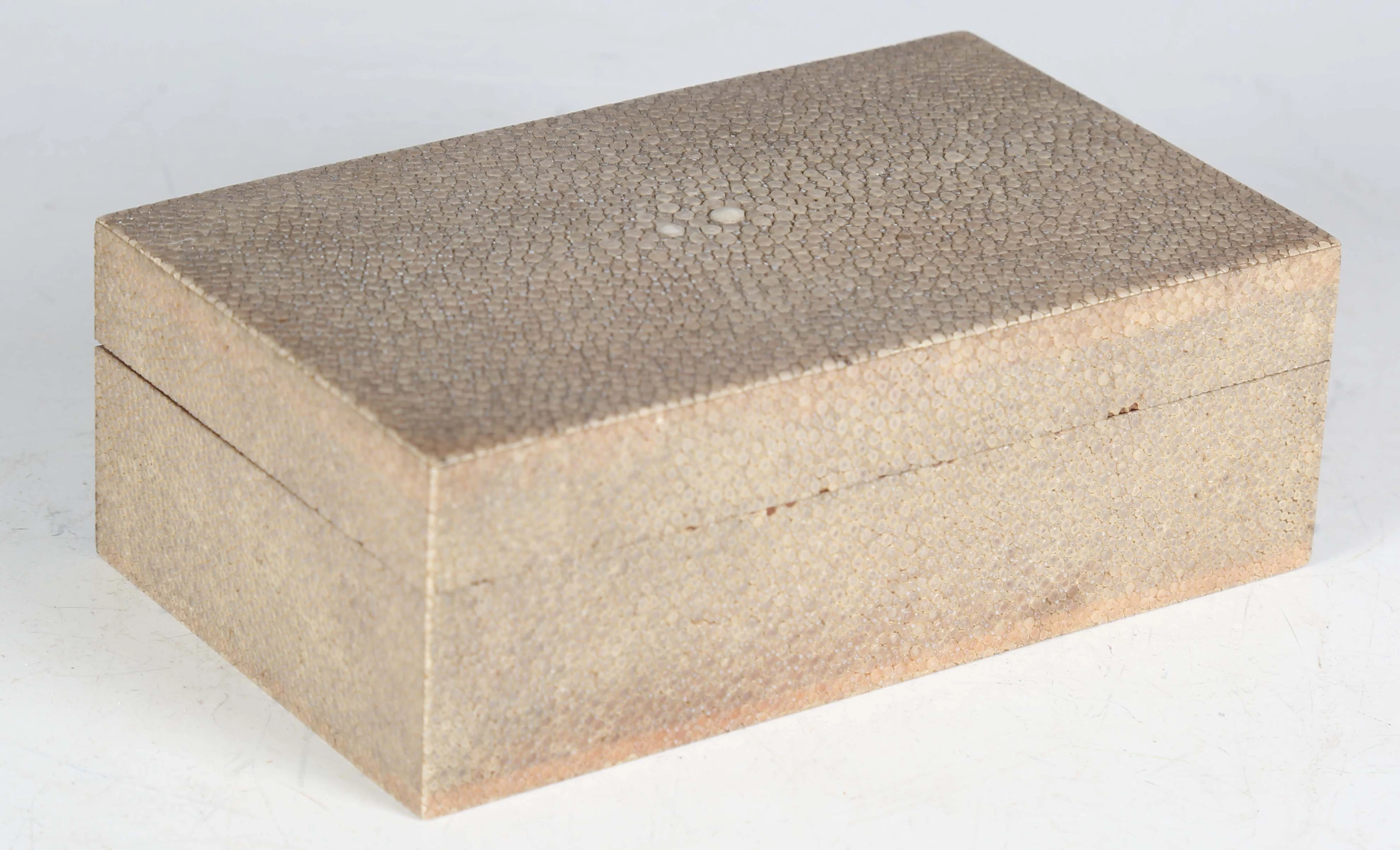 An early 20th century shagreen covered cigarette box, width 17.3cm.