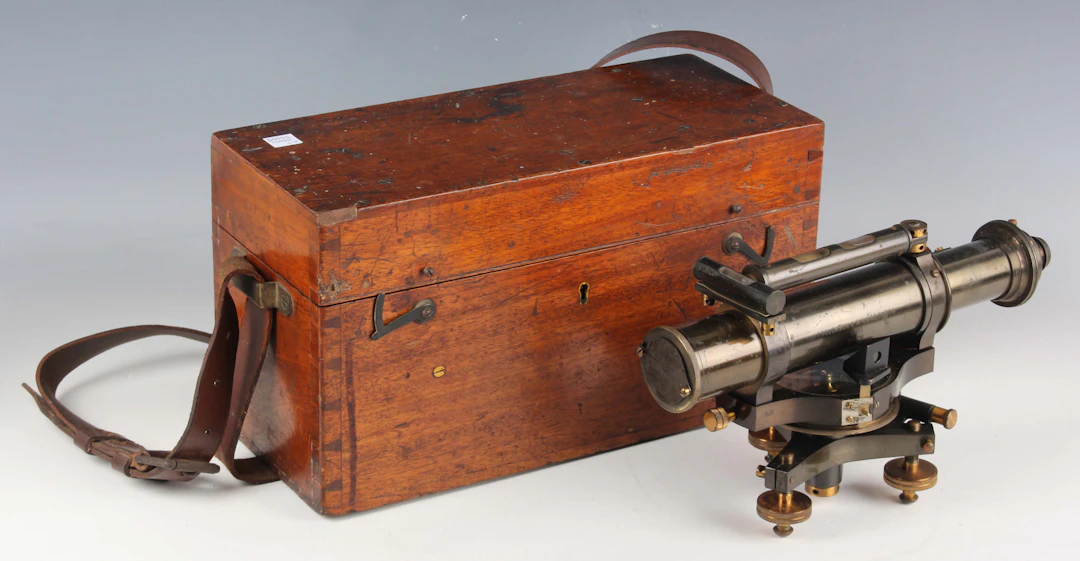 An early 20th century oxidized brass theodolite, signed 'Troughton