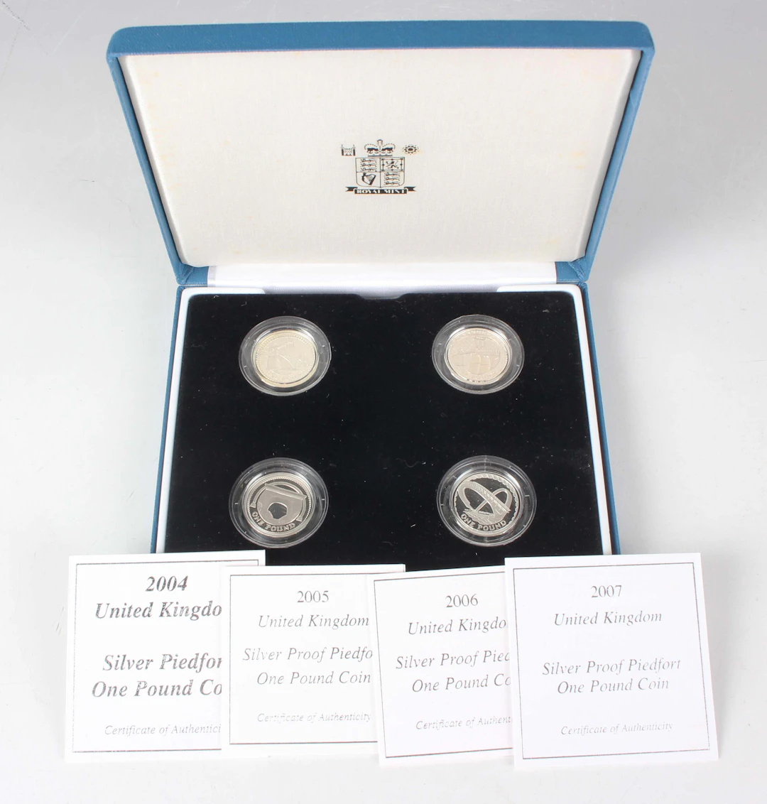 An Elizabeth II Royal Mint silver proof piedfort one pound four-coin