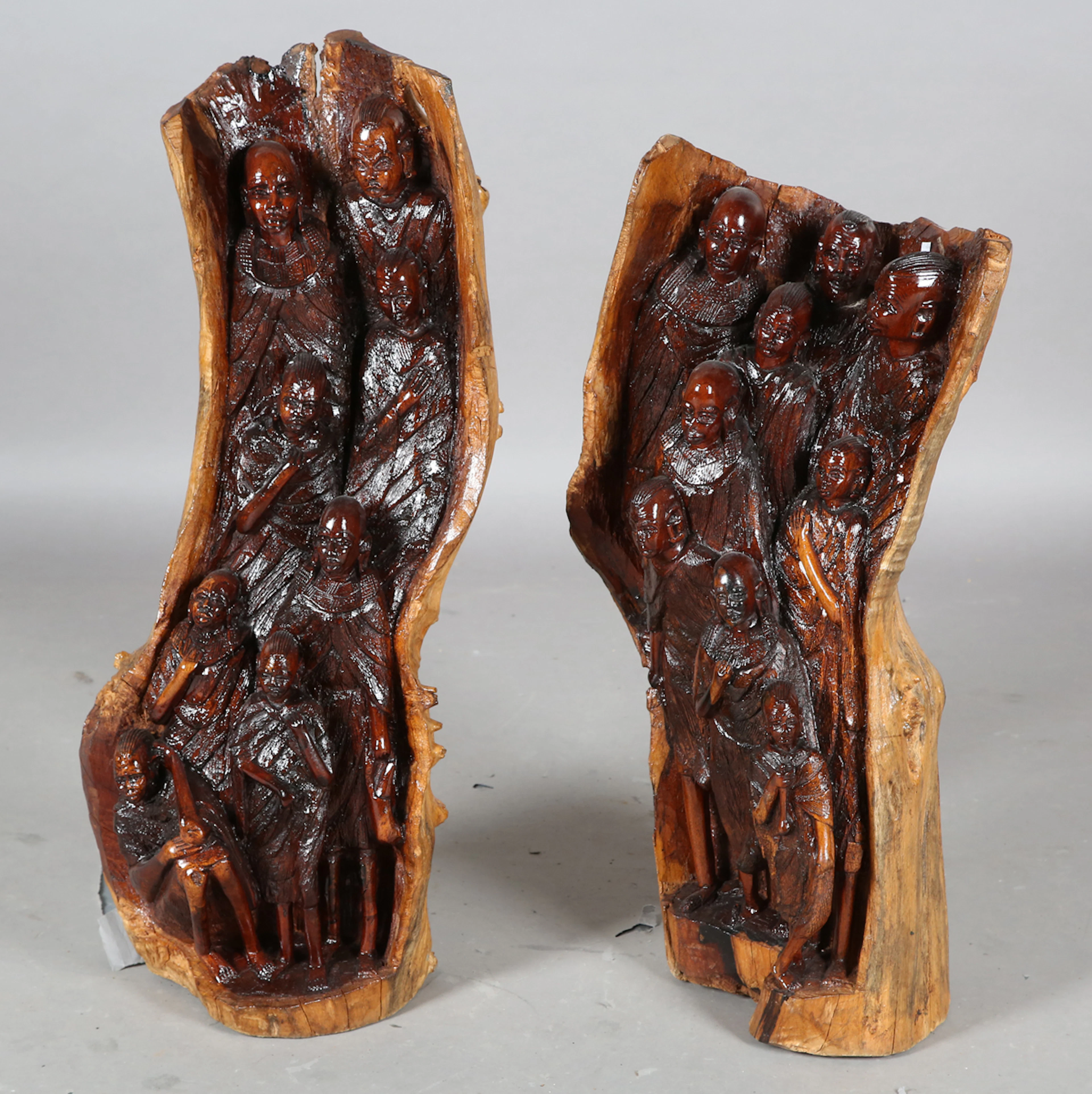 A pair of late 20th century African carved hardwood sculptures, modelled