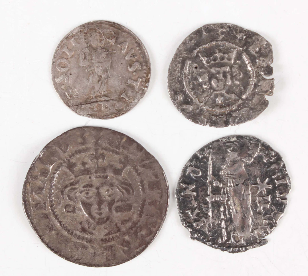 A small group of hammered silver coins, including a Venetian galley-halfpence