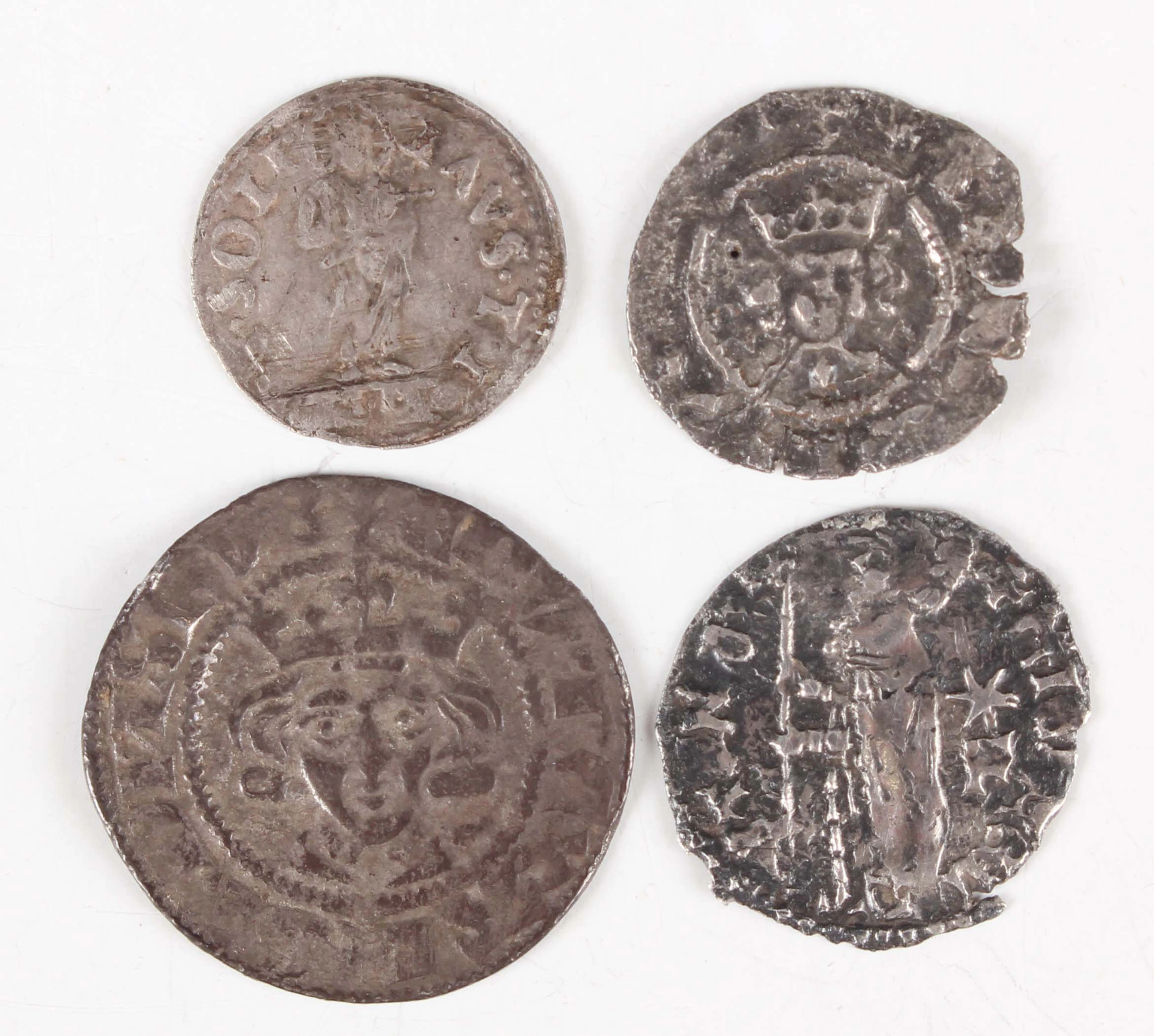 A small group of hammered silver coins, including a Venetian galley-halfpence