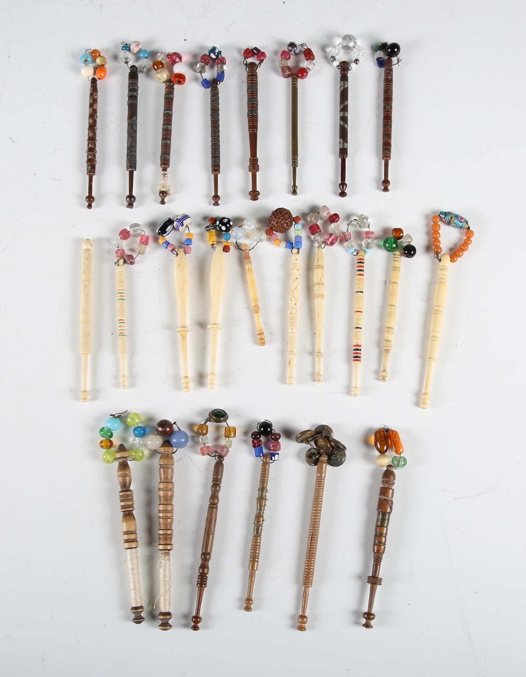 A selection of 19th century and later lace bobbins, including ten