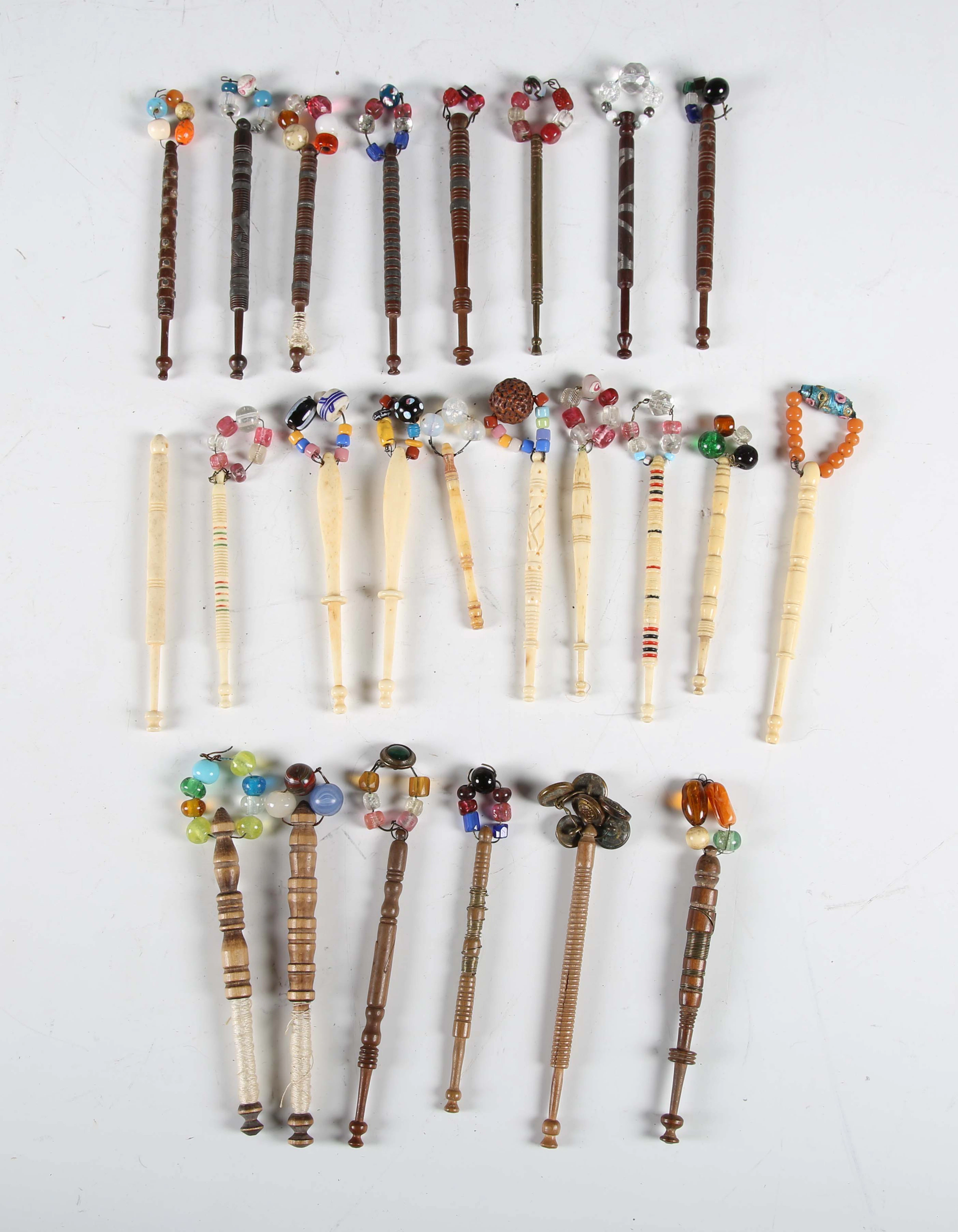 A selection of 19th century and later lace bobbins, including ten