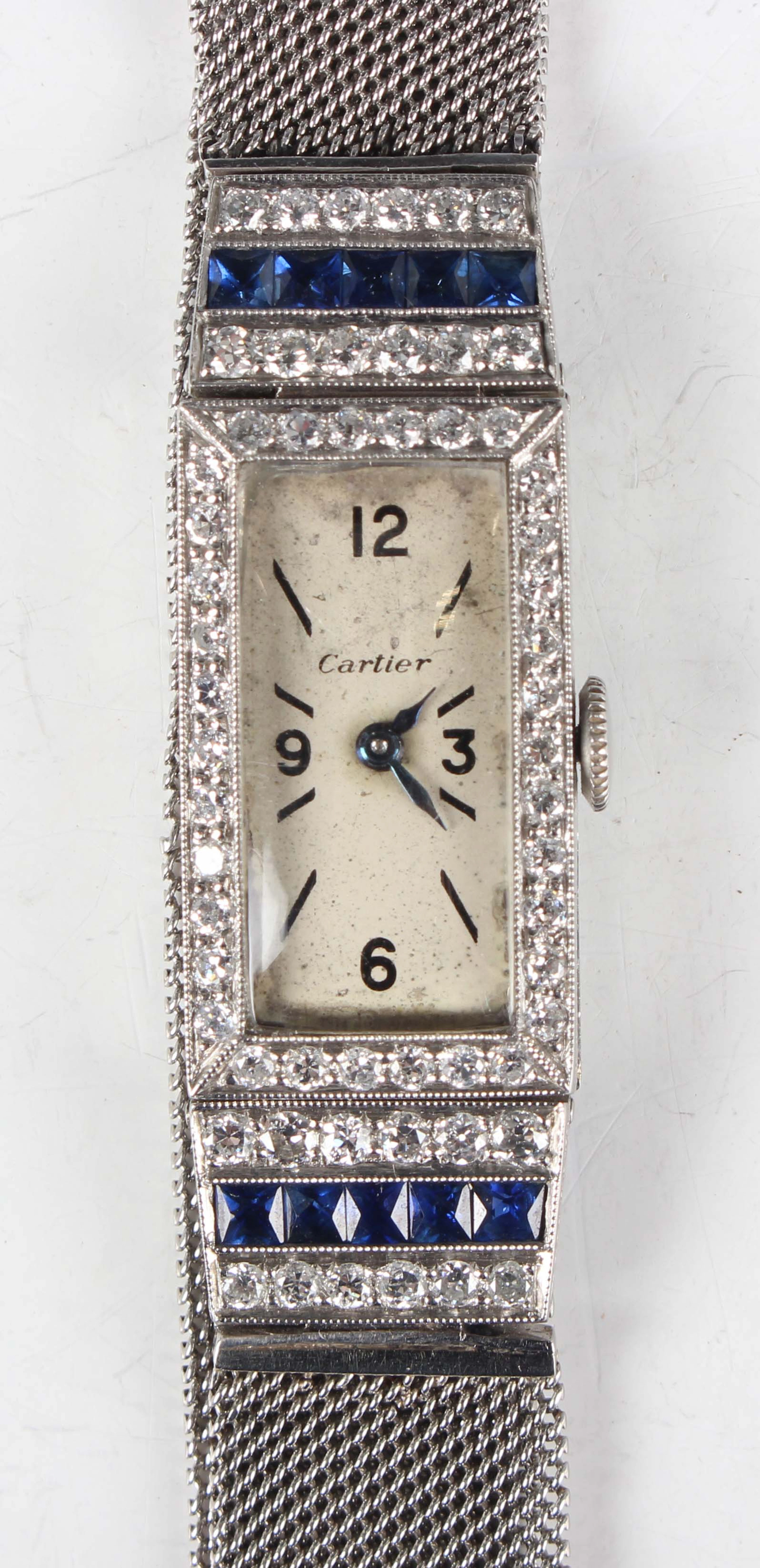 An Art Deco Cartier platinum, diamond and sapphire lady's bracelet