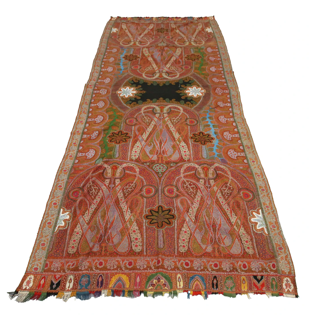 An early 20th century Indian woven cotton 'Paisley' shawl, the central