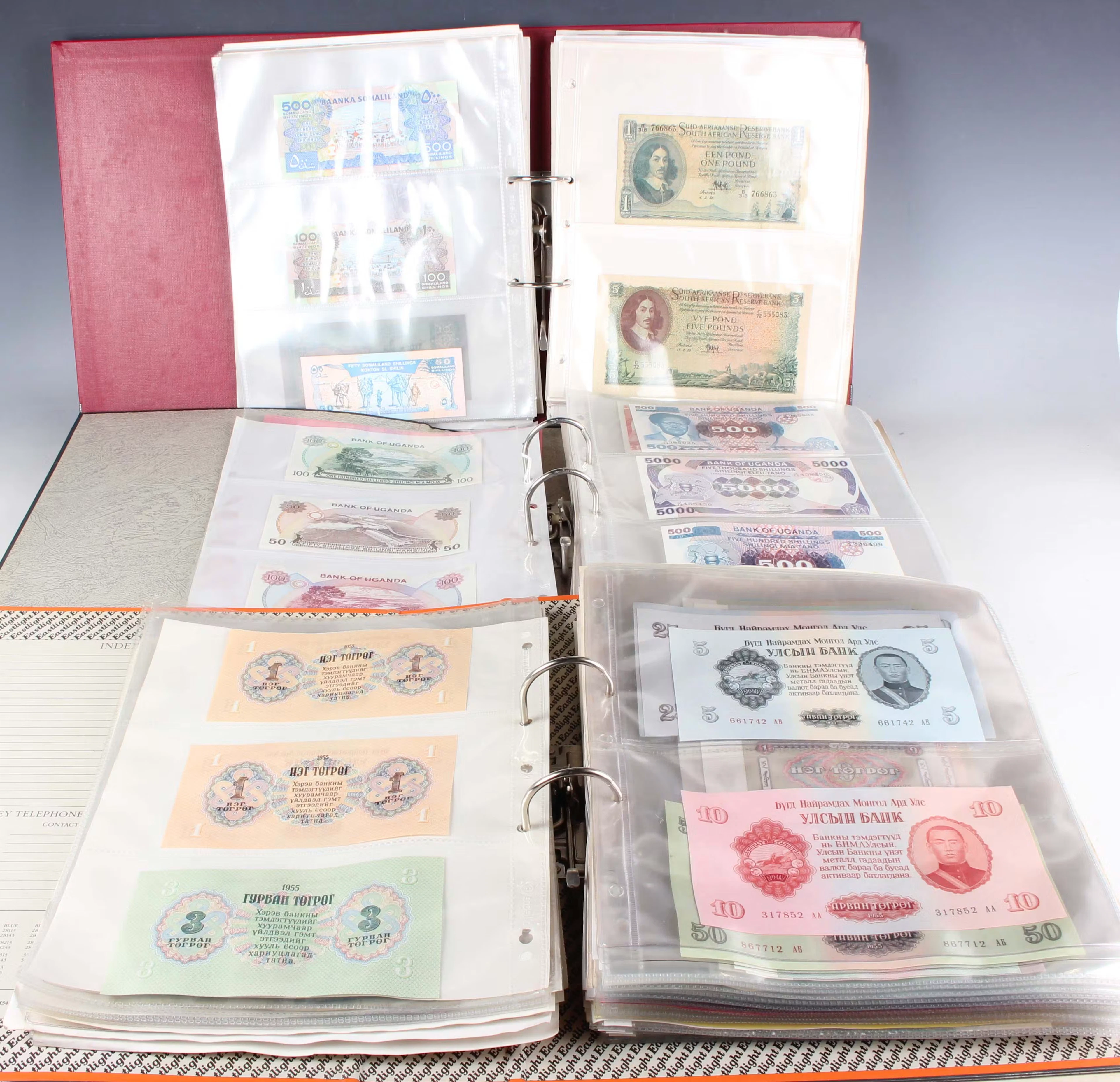 A large collection of European and world banknotes, including Mexico