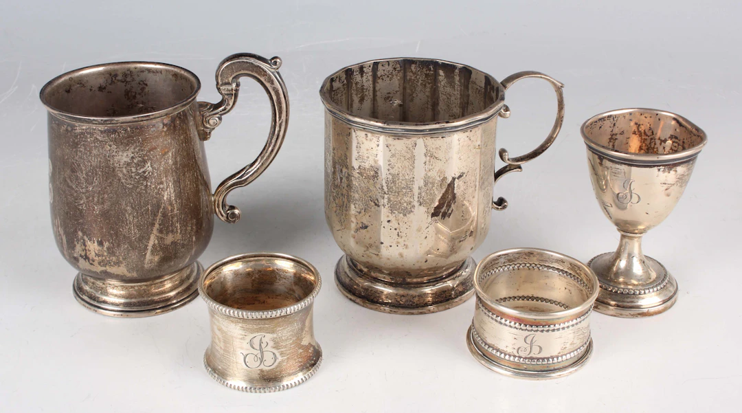 A George V silver christening mug of tapering cylindrical form with