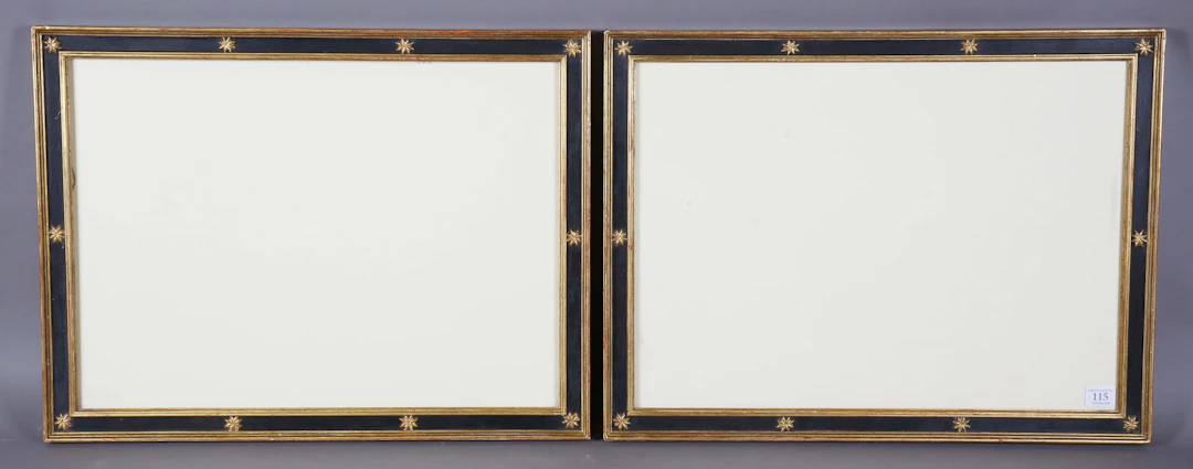A pair of late 20th century black painted and giltwood rectangular