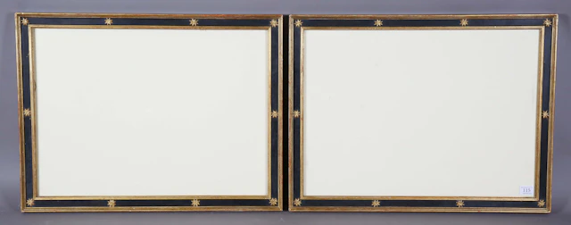 A pair of late 20th century black painted and giltwood rectangular