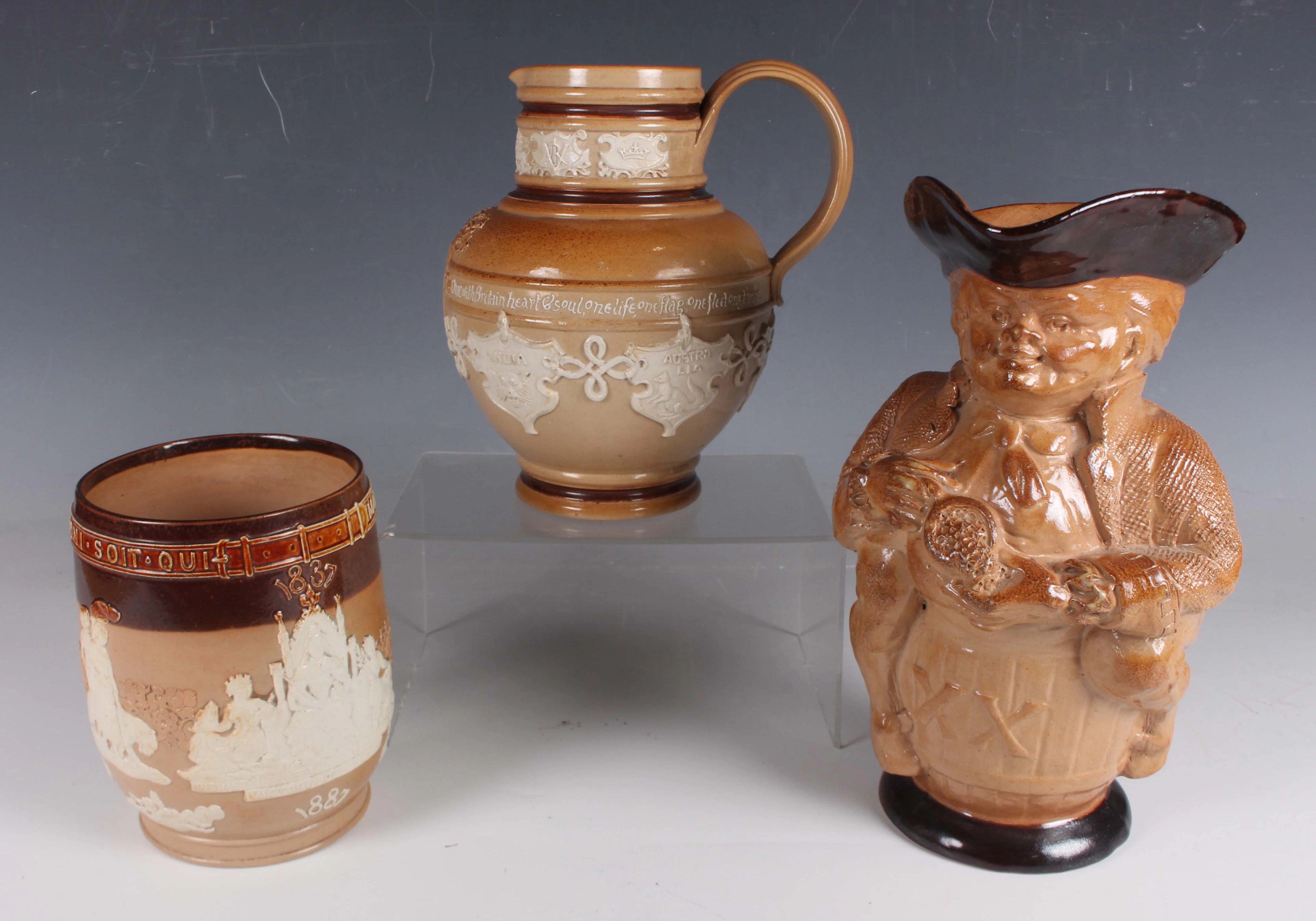 A large Doulton Lambeth stoneware Toby jug, designed by Harry Simeon