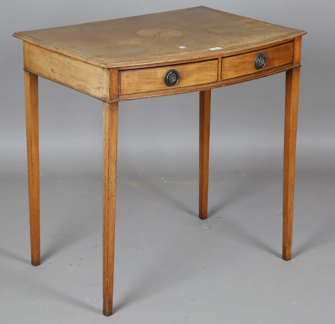 An Edwardian mahogany bowfront side table, the top with an inlaid