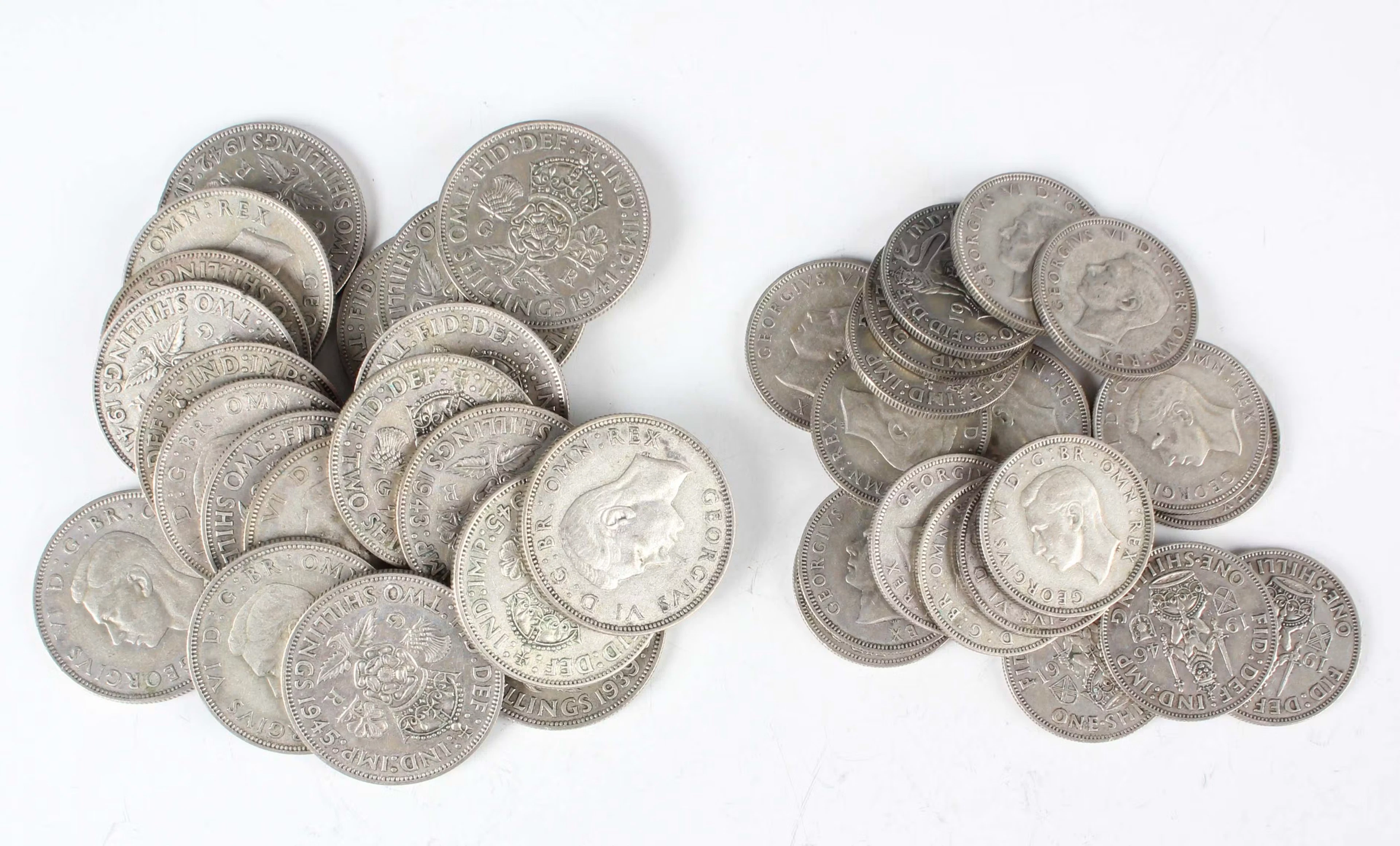 A group of pre-1947 British silver coinage, comprising twenty George