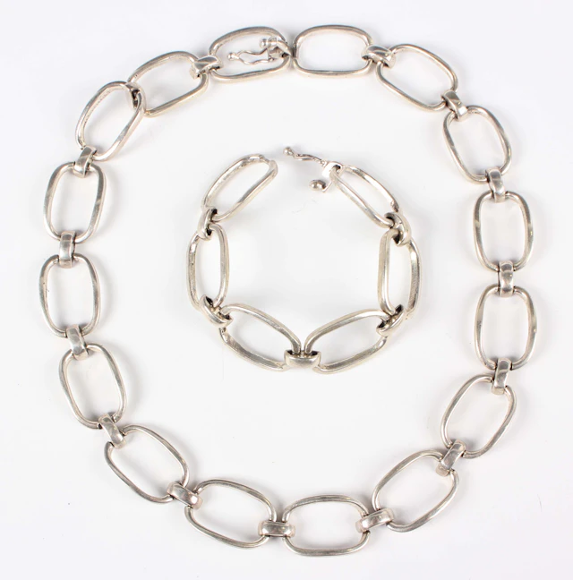 An Egyptian silver necklace in an oval and domed link design, length