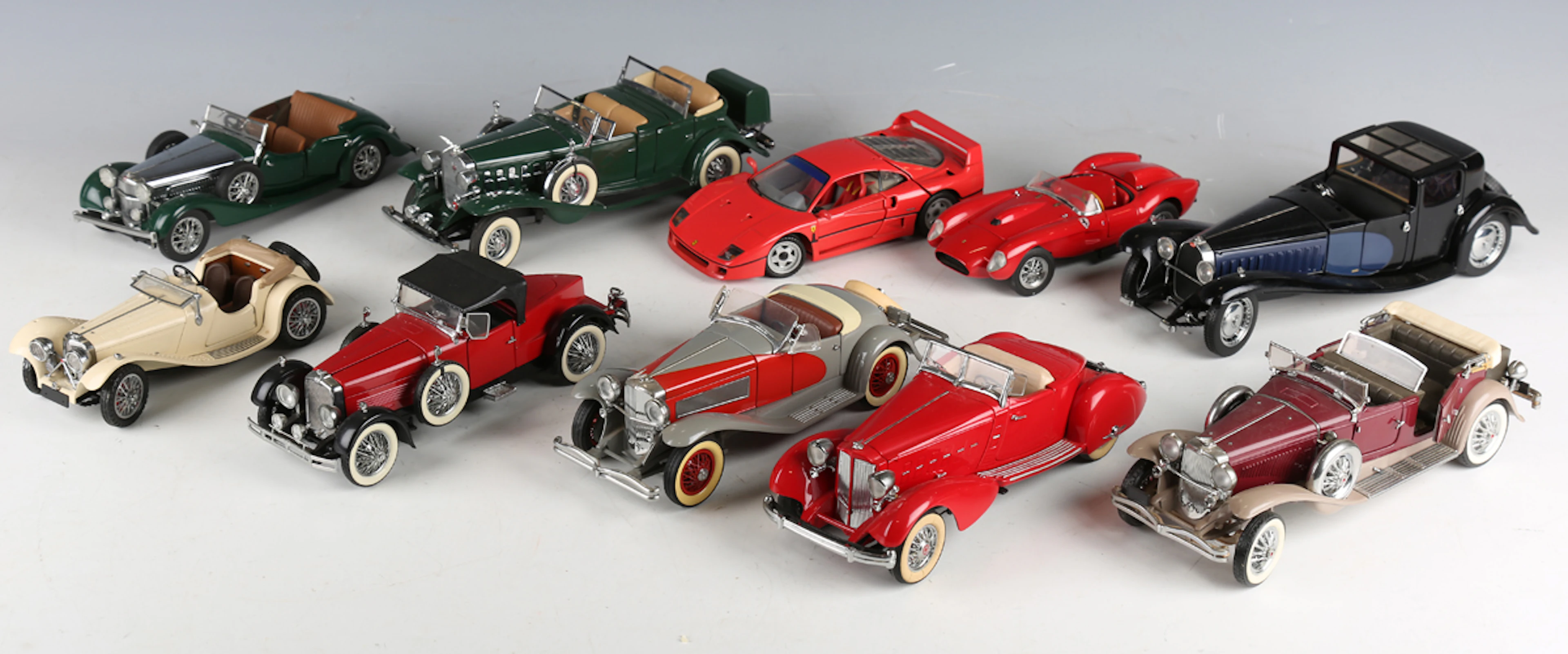 Seven Franklin Mint 1:24 scale model cars, comprising 1938 Alvis 4.3