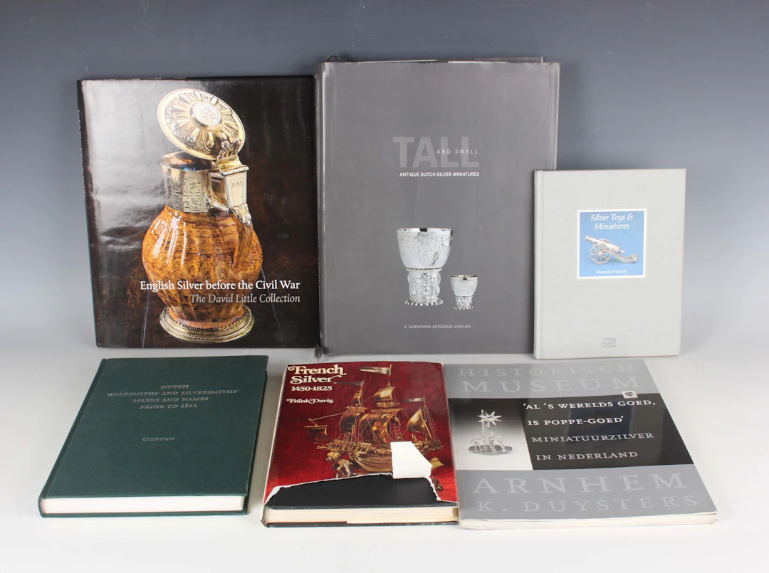 A collection of silver reference books, including 'Tall & Small Antique