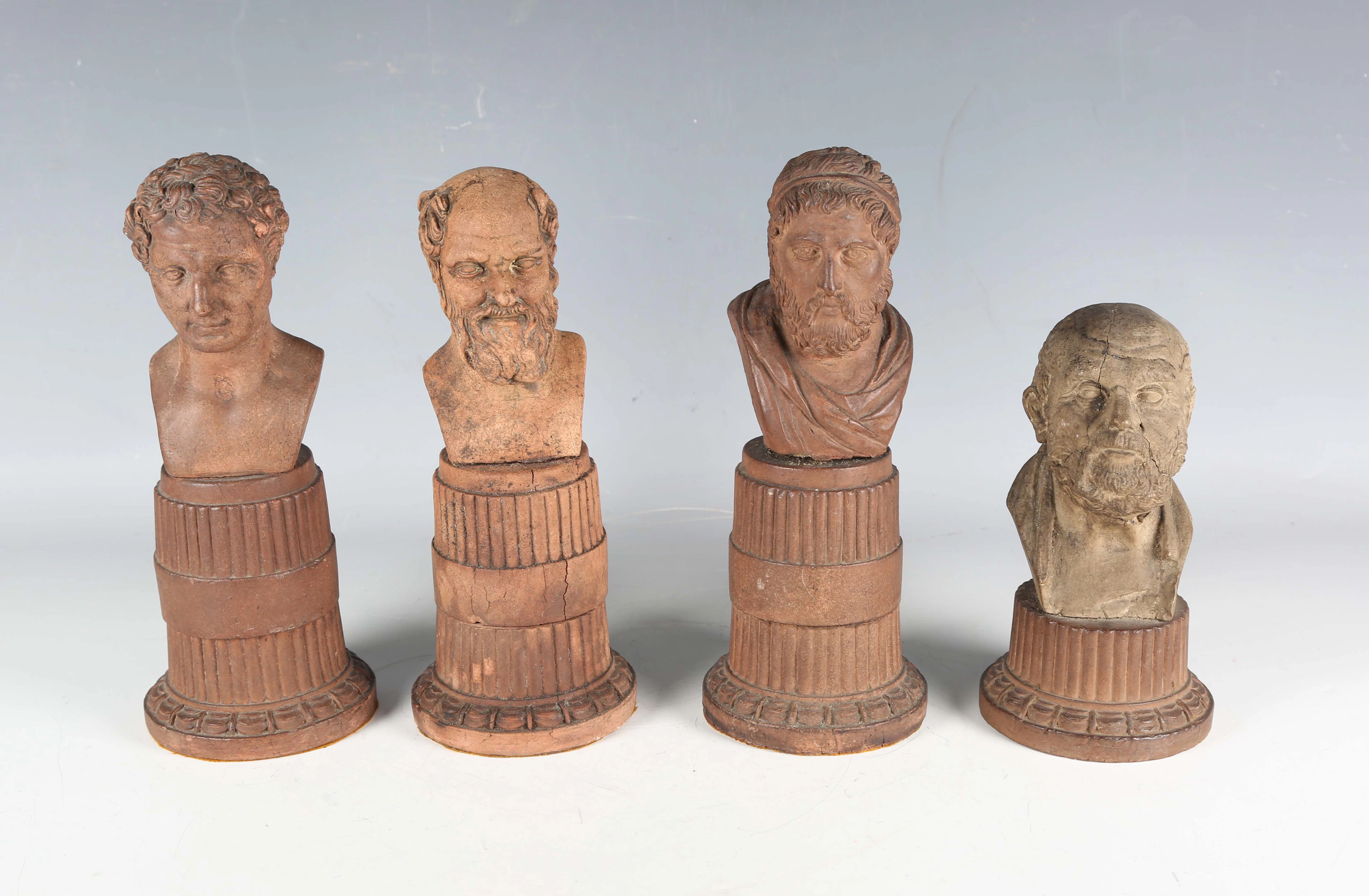 A set of three 18th century Grand Tour terracotta portrait busts of