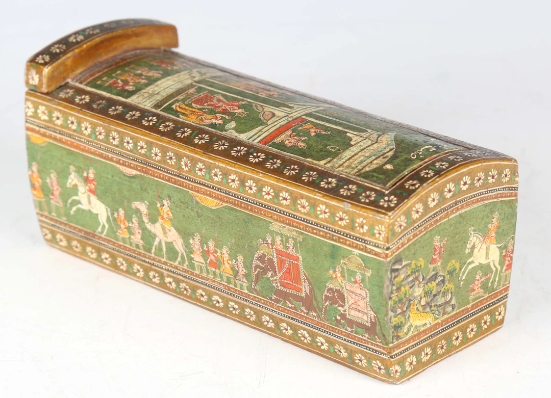 A 19th century Indian Ganjifa playing card set, the lacquered wooden
