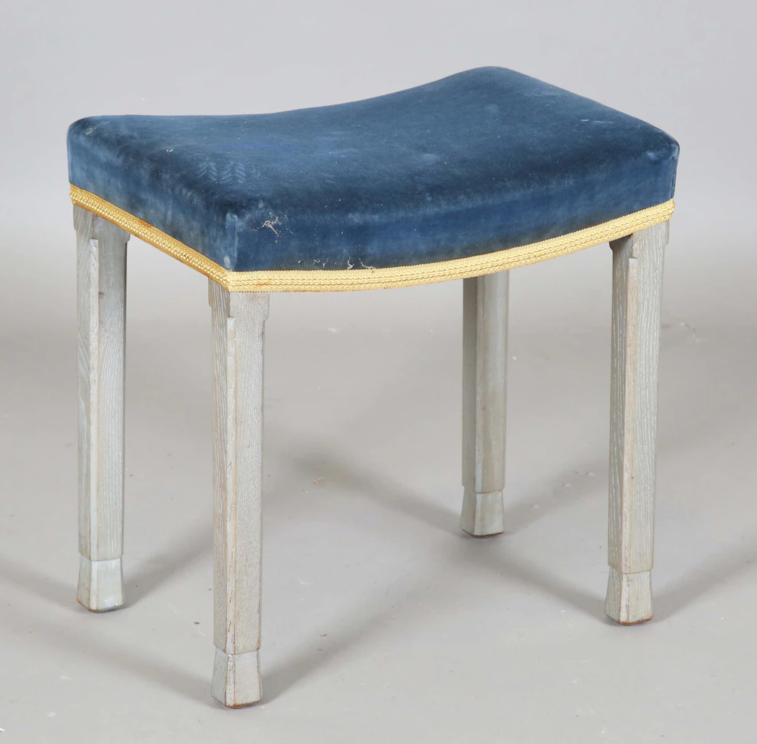 An Elizabeth II coronation stool, the blue velvet seat on grey painted