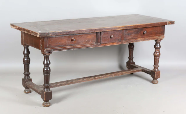A 19th century French walnut serving table, the thick two-plank top