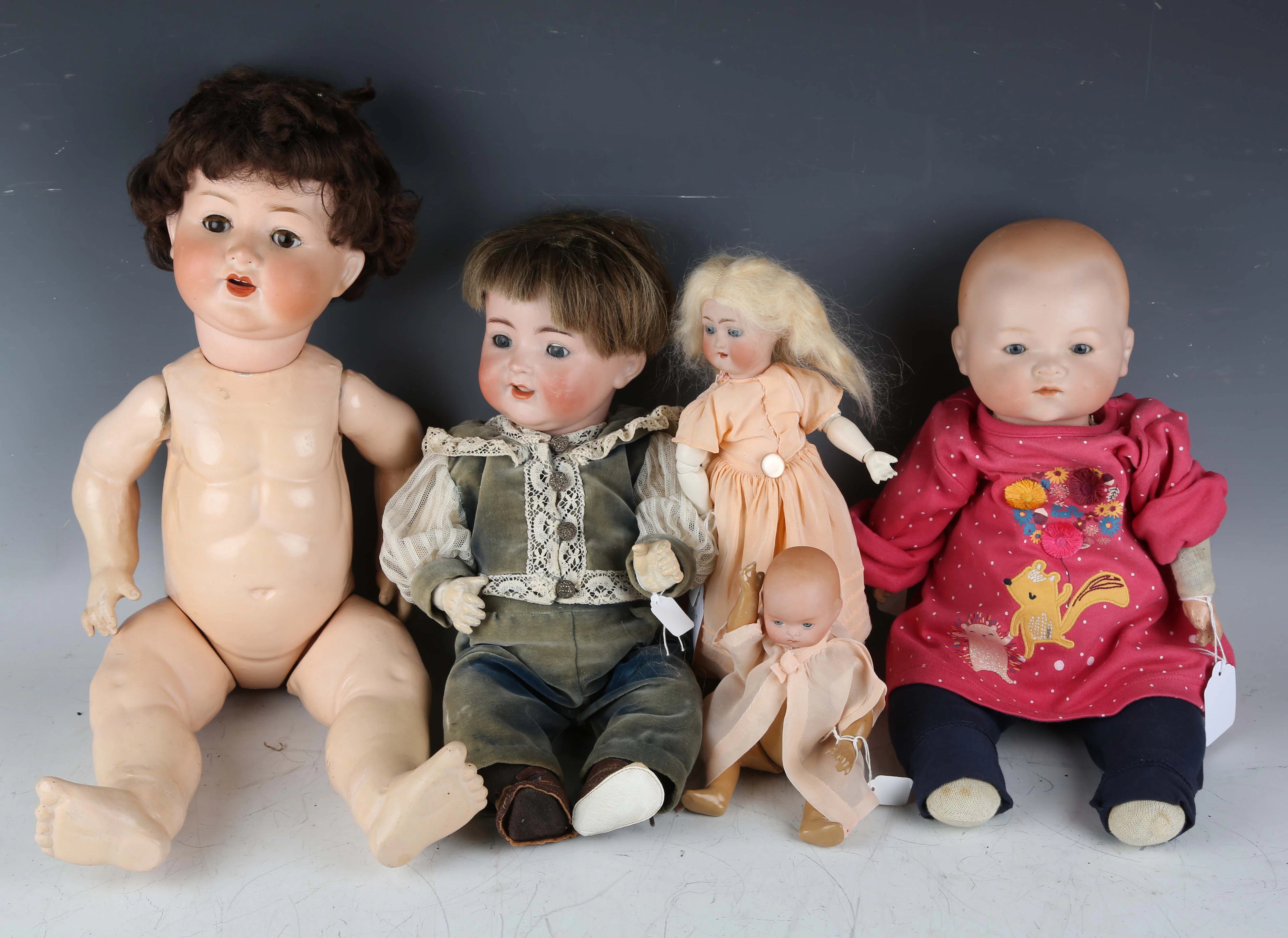A Simon & Halbig K&R bisque head doll, impressed '126', with later