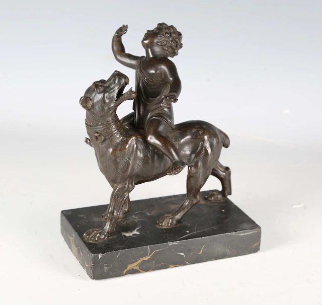 A late 18th/19th century Continental cast bronze figure group of a